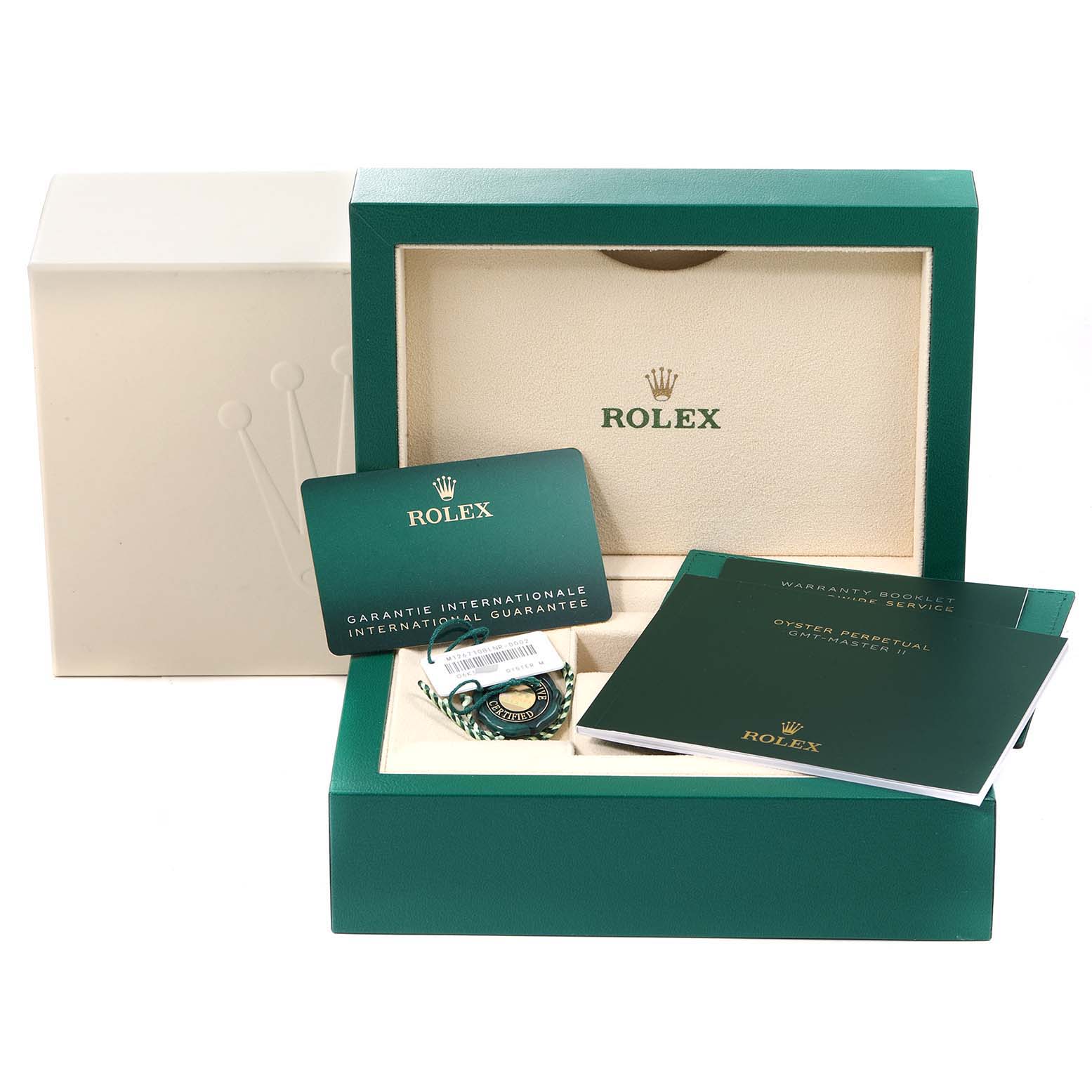 The image shows the packaging, warranty card, and manuals for a Rolex GMT-Master 126710 Men
s Stainless Steel Black Dial 126710 Men
s Stainless Steel Black Dial watch, viewed from the front.