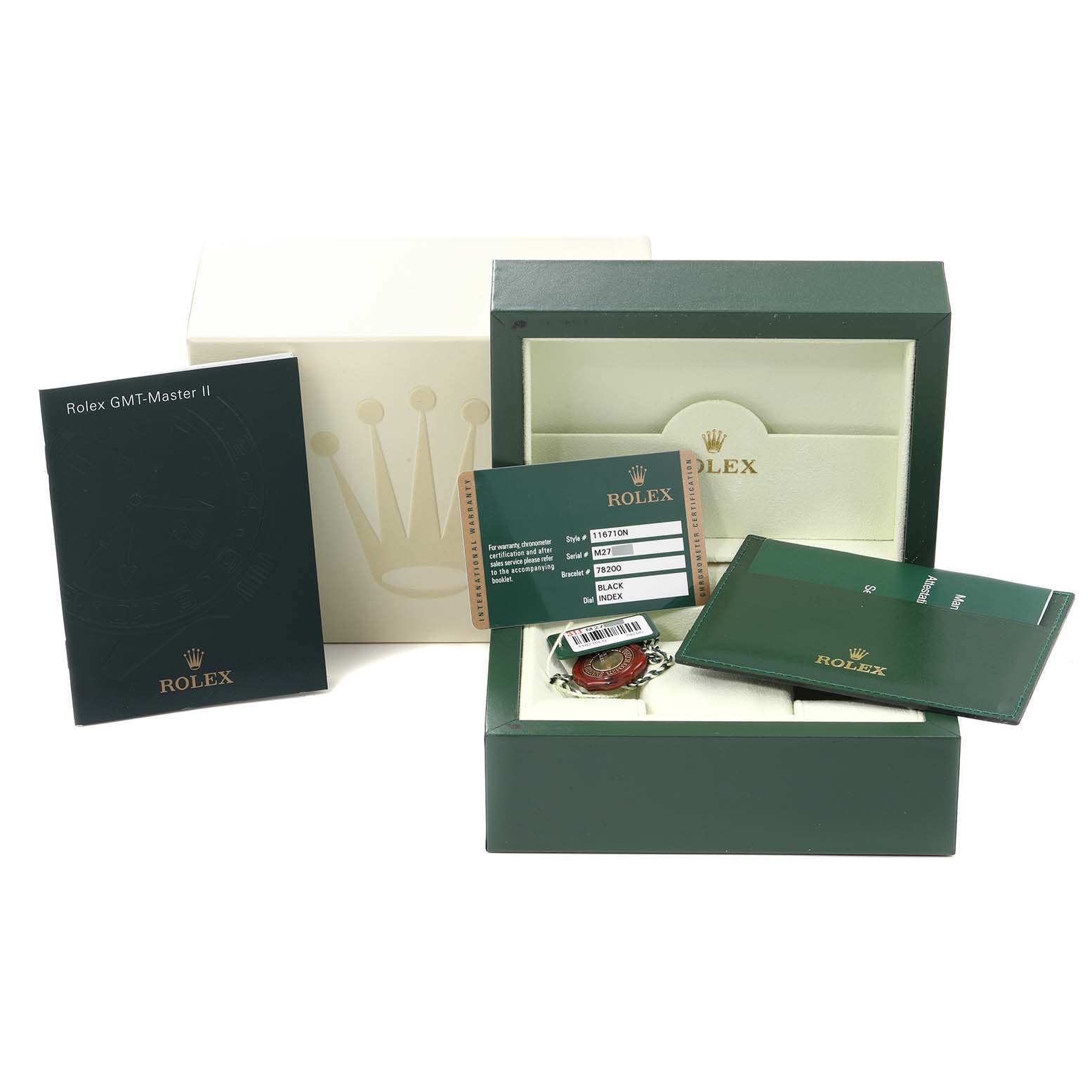 The image shows the packaging and accessories of a Rolex GMT-Master 116710 Men
s Stainless Steel Black Dial 116710 Men
s Stainless Steel Black Dial II, including the box, manuals, and warranty card.