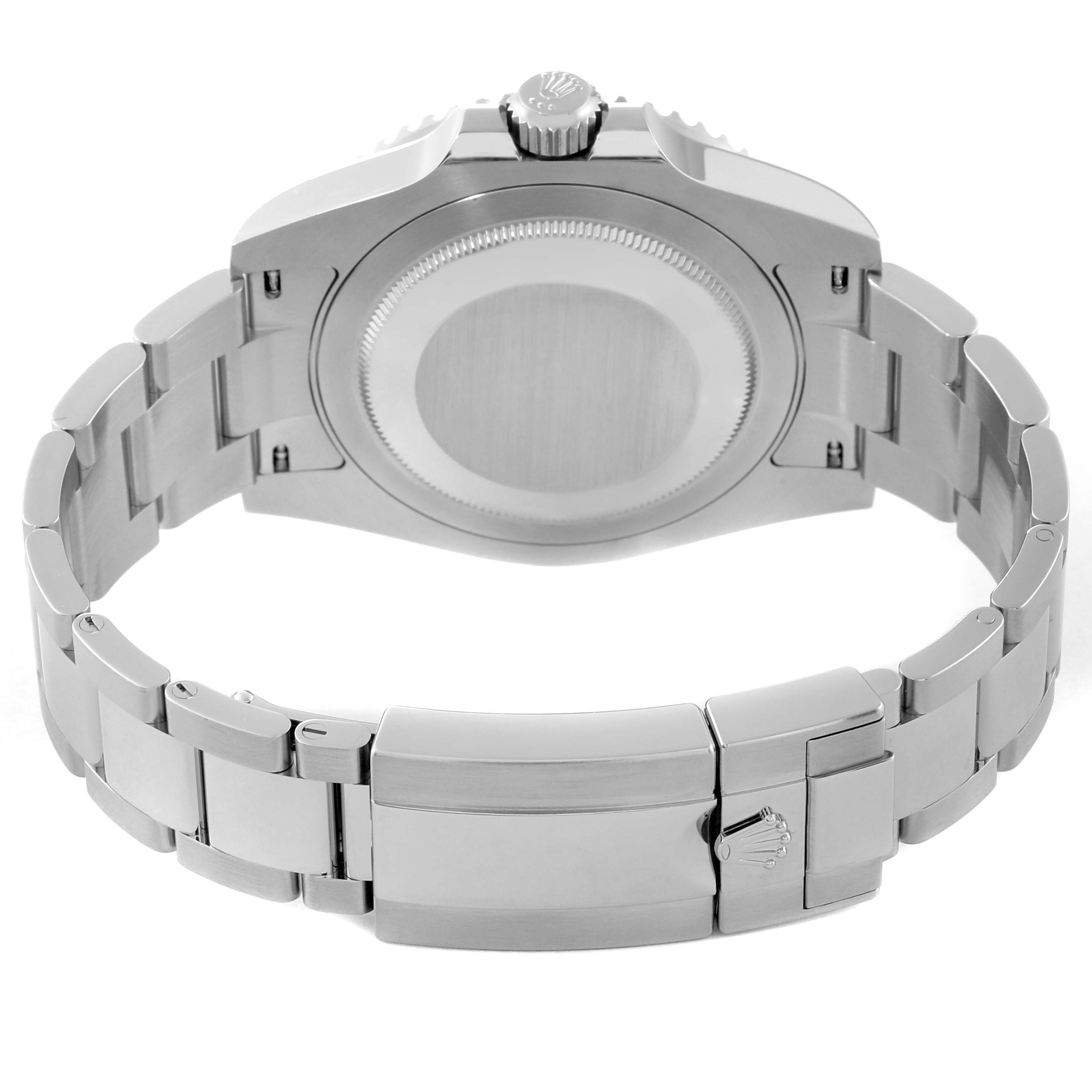 The image shows the back view of a Rolex GMT-Master 126720 Men
s Stainless Steel Black Dial, highlighting the case back, bezel, and clasp of the bracelet.