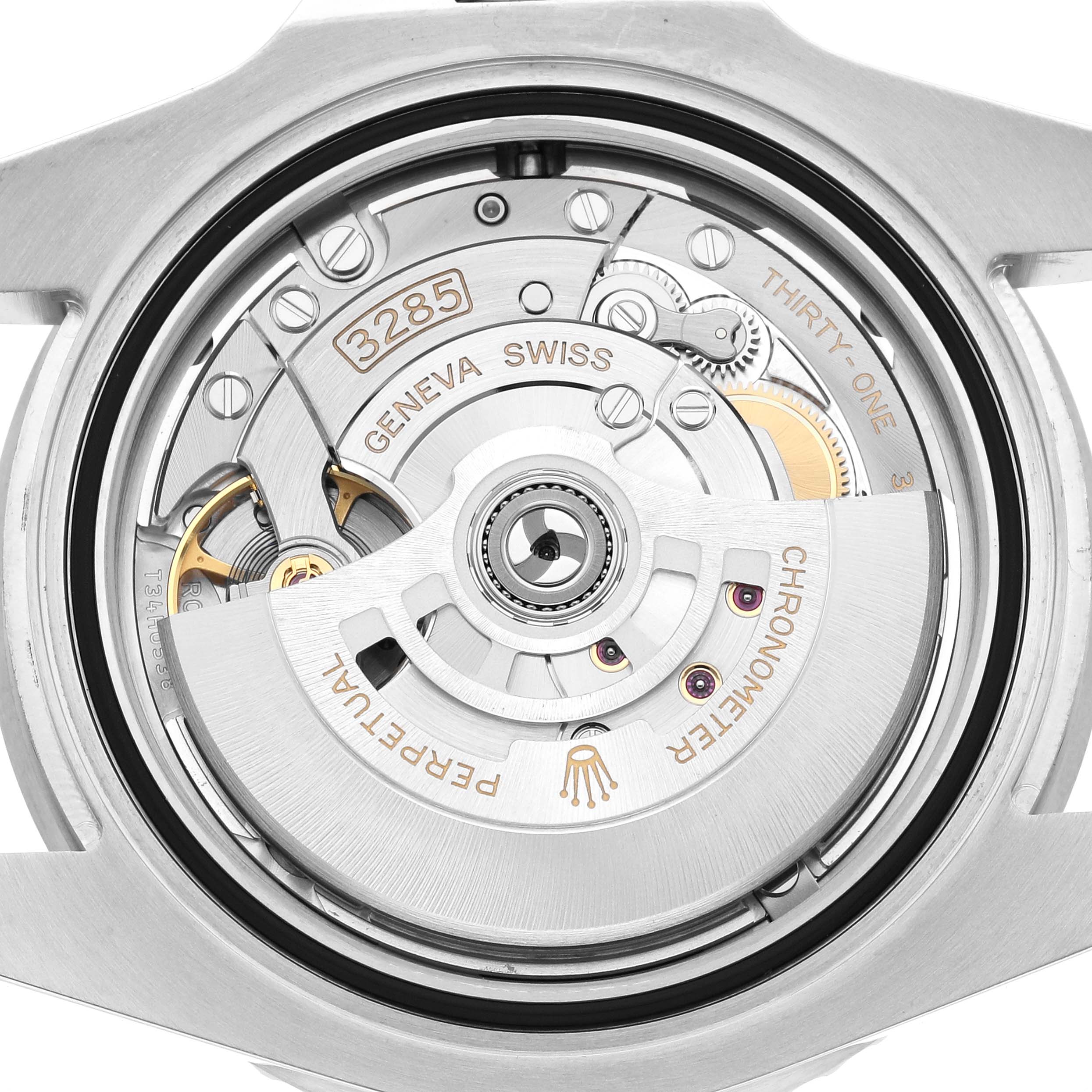 The image shows the open case back of a Rolex GMT-Master 126720 Men
s Stainless Steel Black Dial, highlighting the intricate movement mechanism inside.