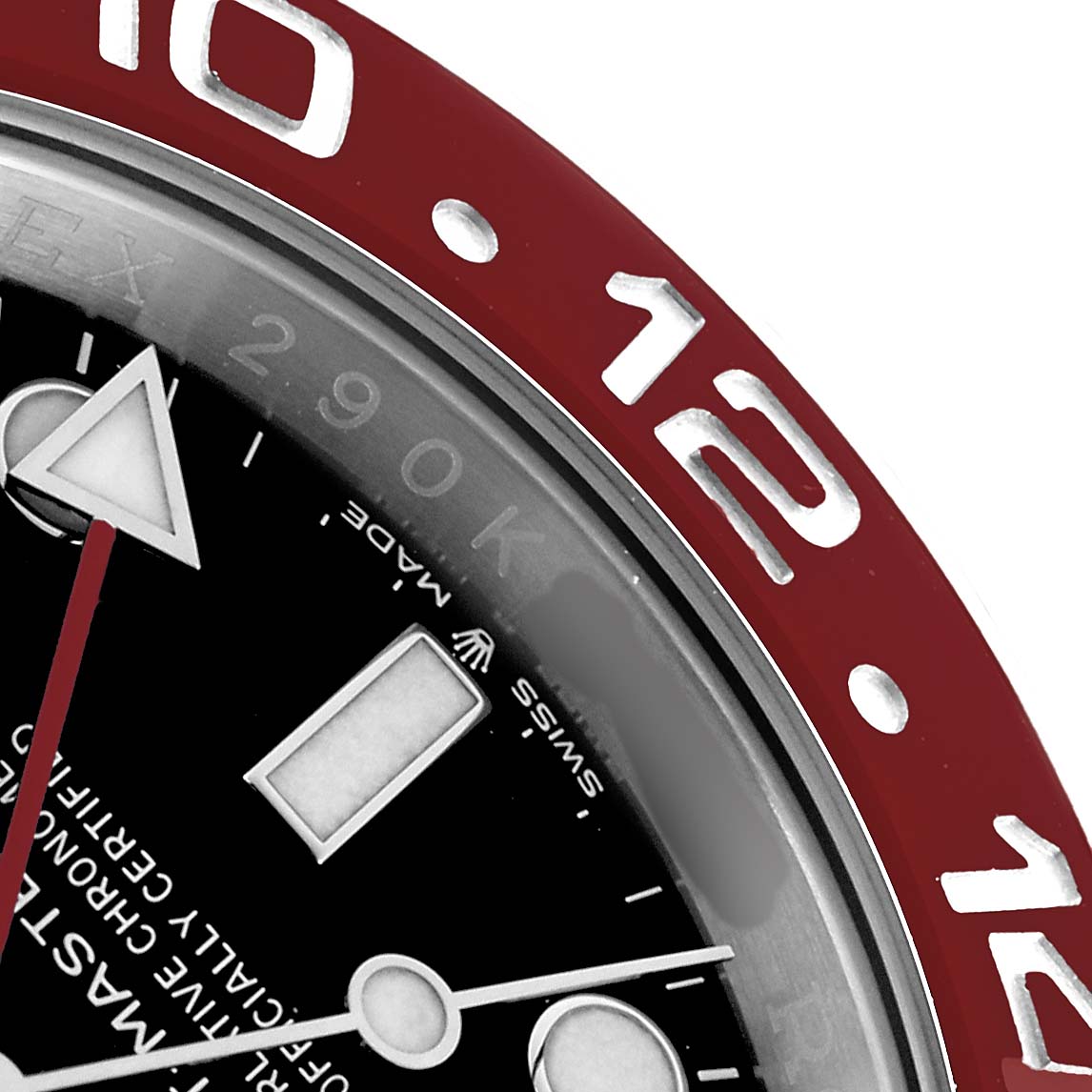 The image shows a close-up of the Rolex GMT-Master 126710 Men
s Stainless Steel Black Dial bezel and part of the dial, focusing on the indices and red 24-hour bezel.