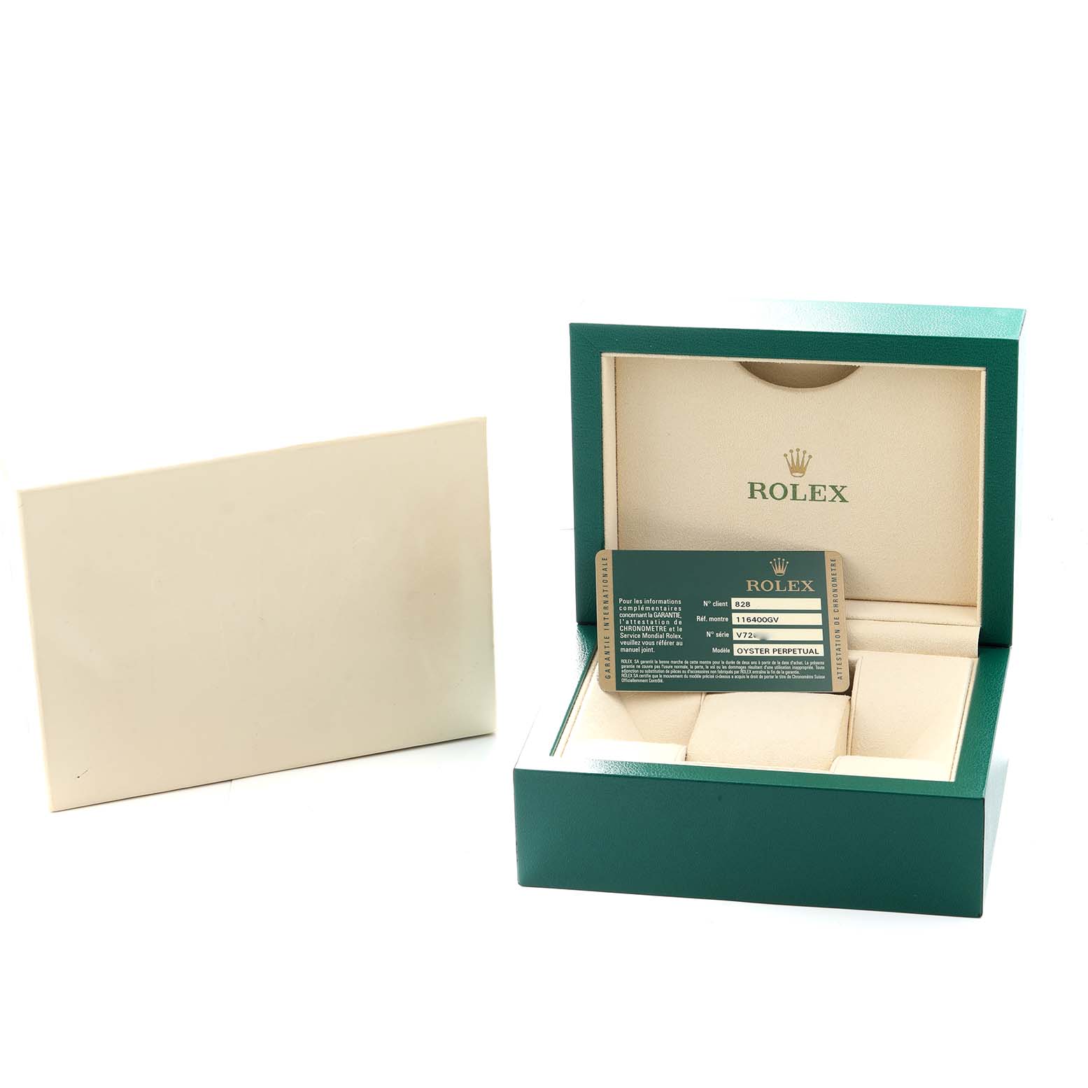 The image shows a Rolex Milgauss 116400 Men
s Stainless Steel Black Dial watch box at a slight angle, with an open lid and warranty card inside.