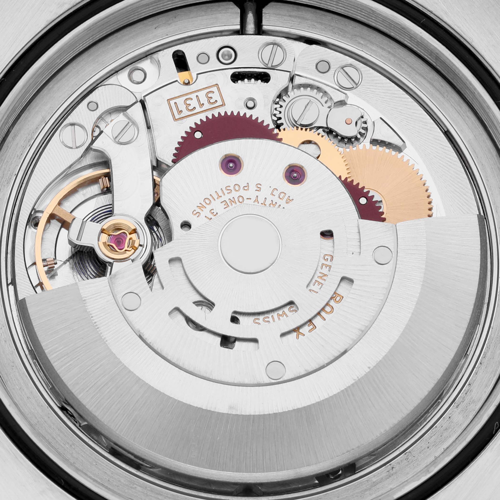 The image shows a close-up of the Rolex Milgauss 116400 Men
s Stainless Steel Black Dial watch movement from a top-down angle, highlighting gears and mechanisms.