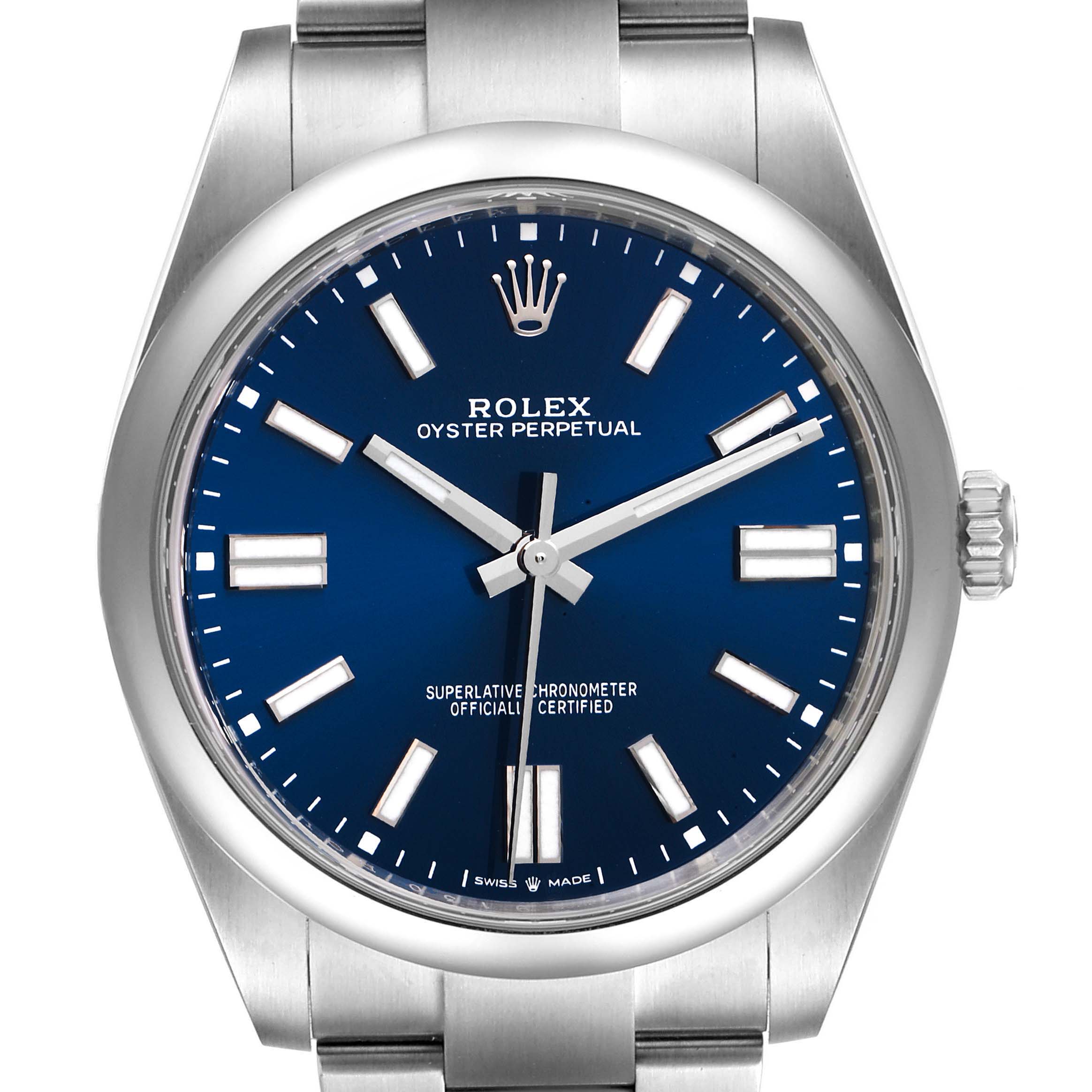 This image shows a front view of a Rolex Oyster Perpetual 124300 Men
s Stainless Steel Blue Dial 124300 Men
s Stainless Steel Blue Dial watch, highlighting the dial, hands, and part of the bracelet.