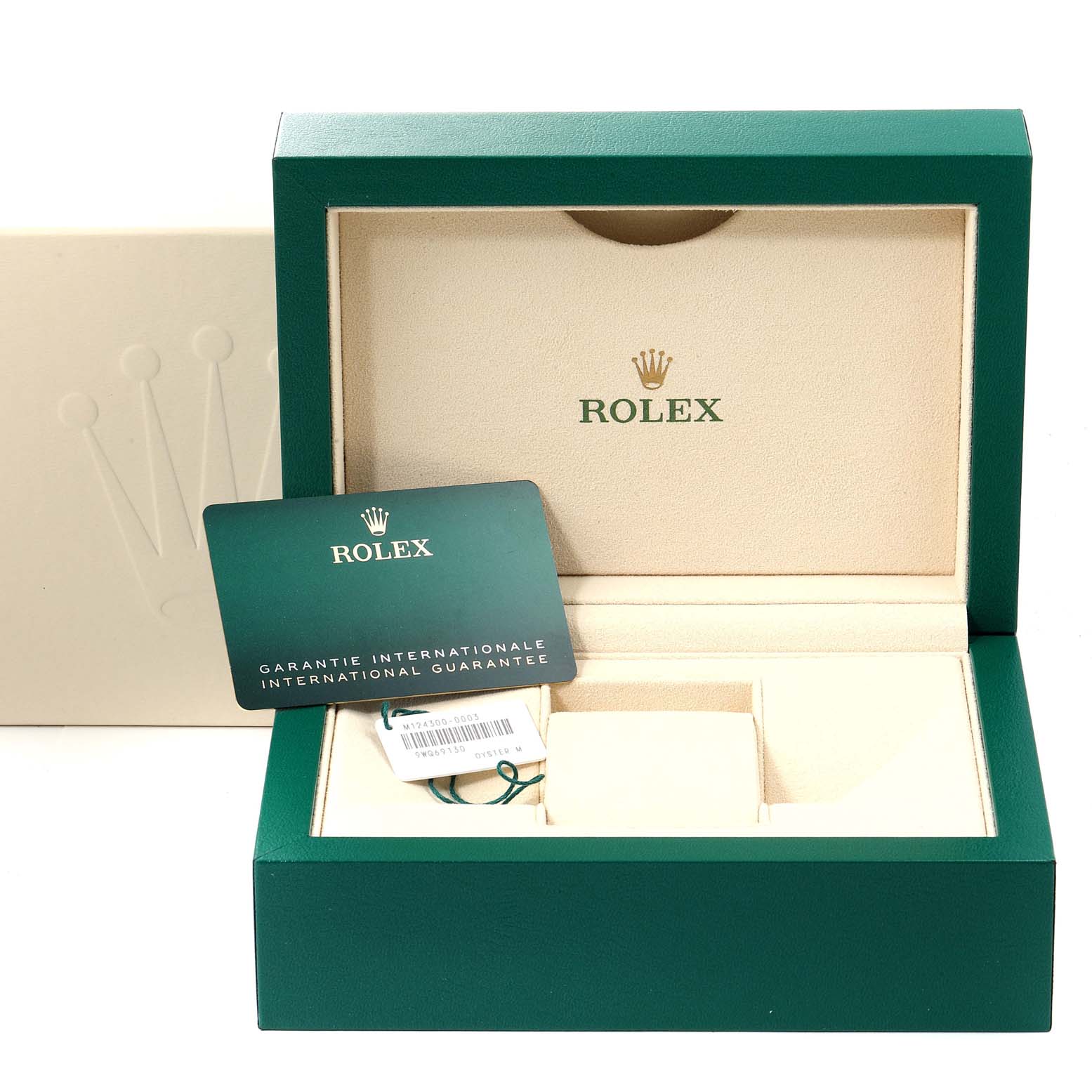 This image shows the open box, warranty card, and tags for the Rolex Oyster Perpetual 124300 Men
s Stainless Steel Blue Dial 124300 Men
s Stainless Steel Blue Dial watch.