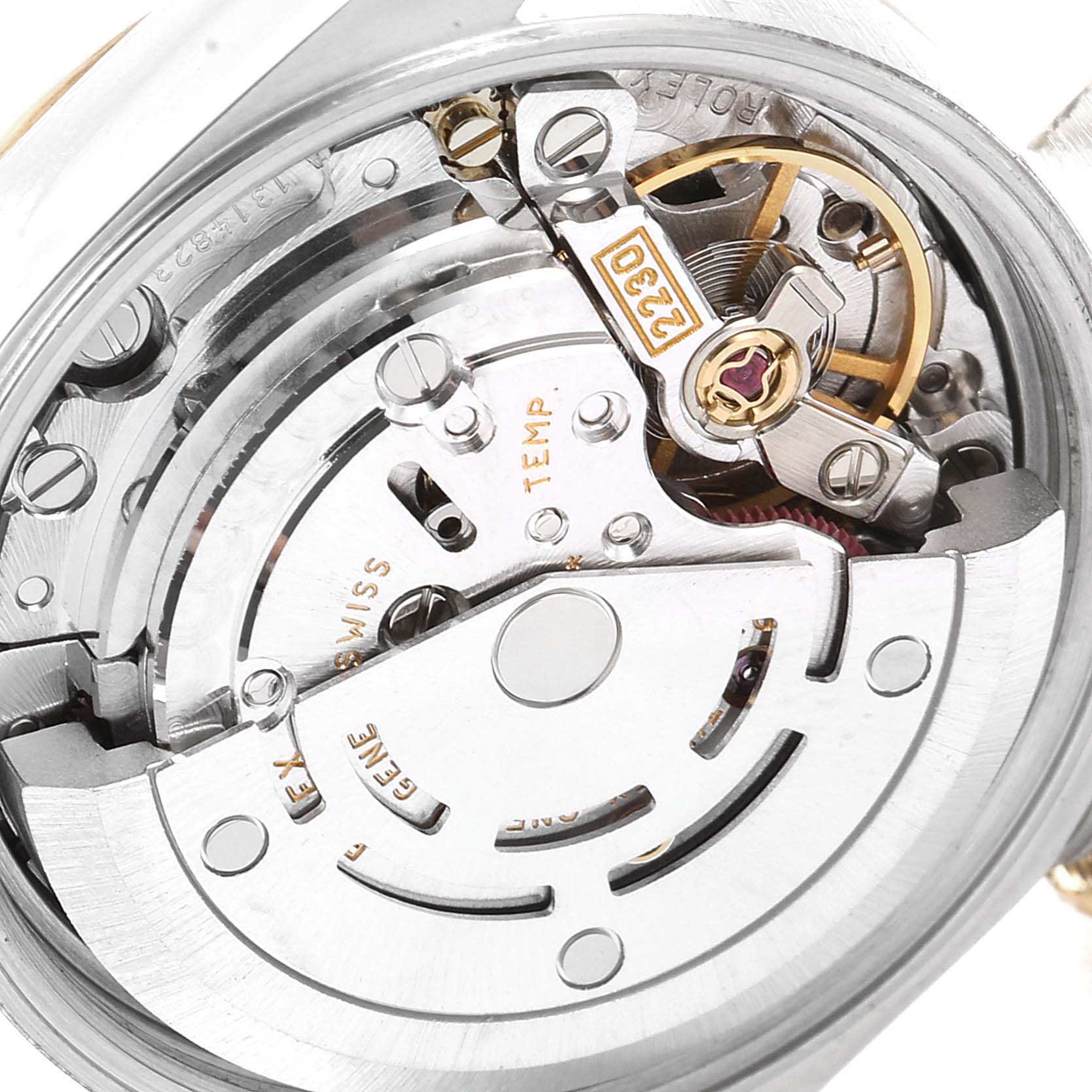 This image shows a close-up view of the internal movement mechanism of a Rolex Oyster Perpetual 76183 Women's Steel and Gold (two tone) Grey Dial 76183 Women's Steel and Gold (two tone) Grey Dial watch.