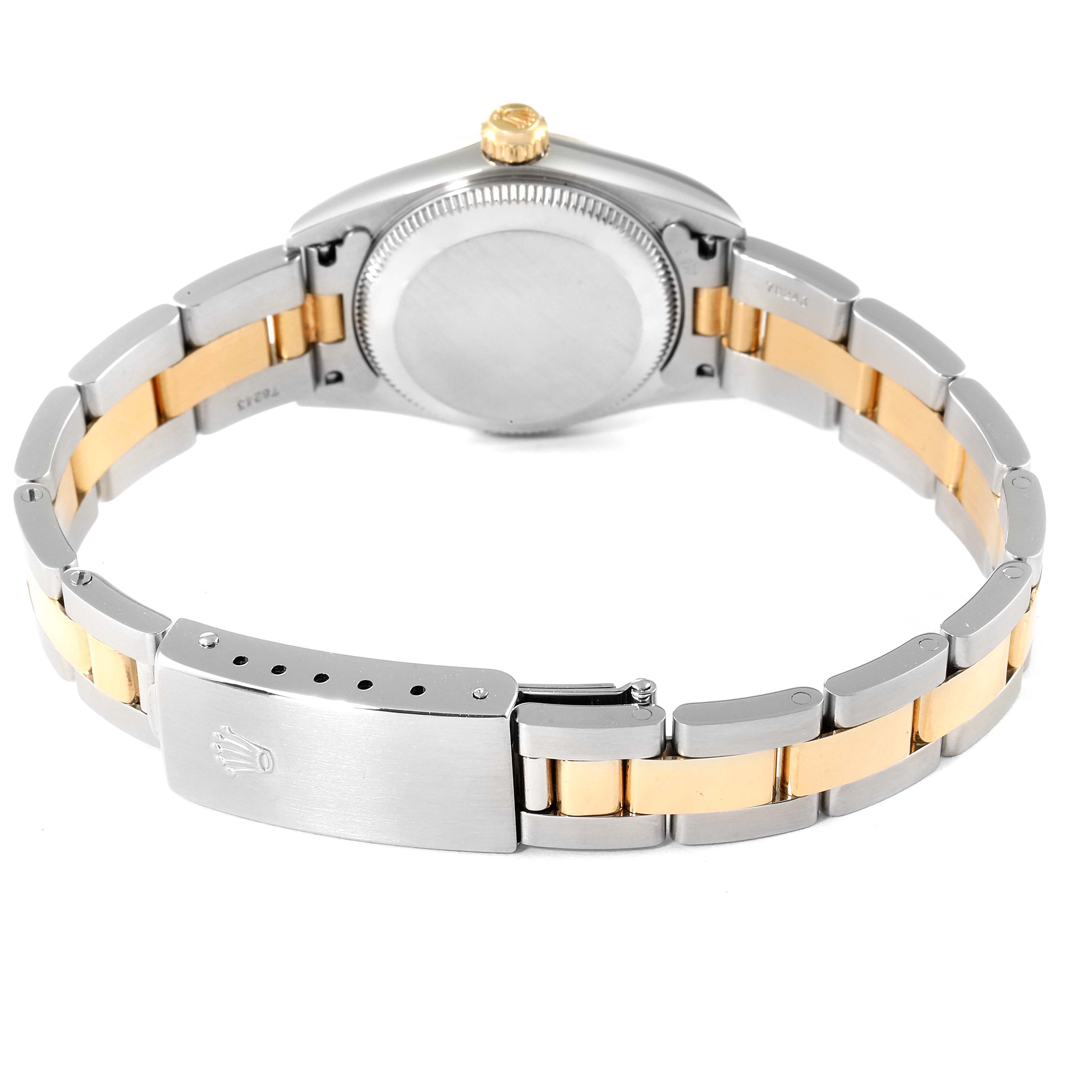 The image shows the back view of a Rolex Oyster Perpetual 76183 Women's Steel and Gold (two tone) Grey Dial 76183 Women's Steel and Gold (two tone) Grey Dial watch, highlighting the case back and two-tone metal bracelet.