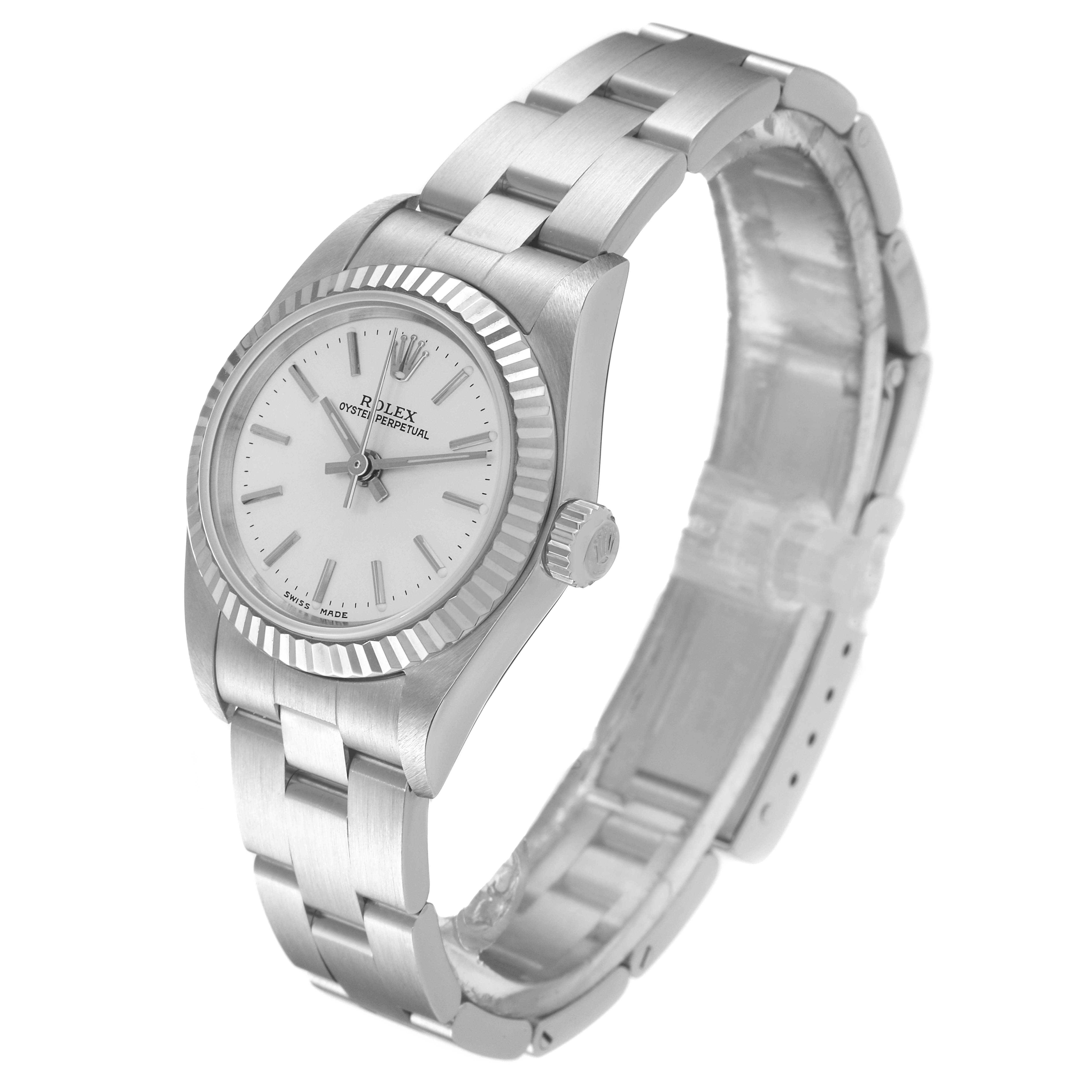 This image shows a Rolex Oyster Perpetual 76094 Women
s Stainless Steel Silver Dial 76094 Women
s Stainless Steel Silver Dial watch at a three-quarter angle, highlighting the face, bezel, bracelet, and crown.