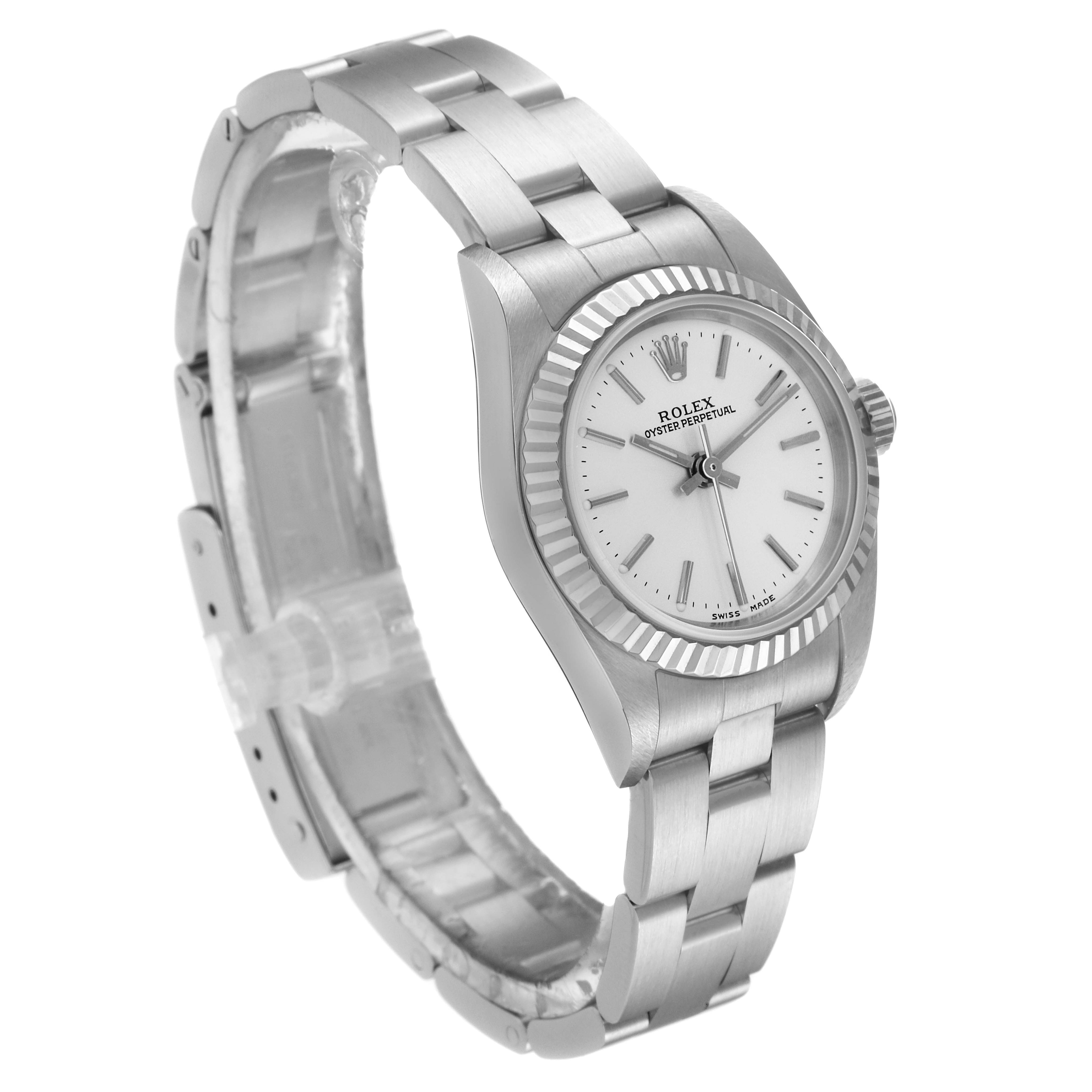 The image shows a Rolex Oyster Perpetual 76094 Women
s Stainless Steel Silver Dial 76094 Women
s Stainless Steel Silver Dial watch at a slight angle, displaying its case, dial, bezel, and bracelet.