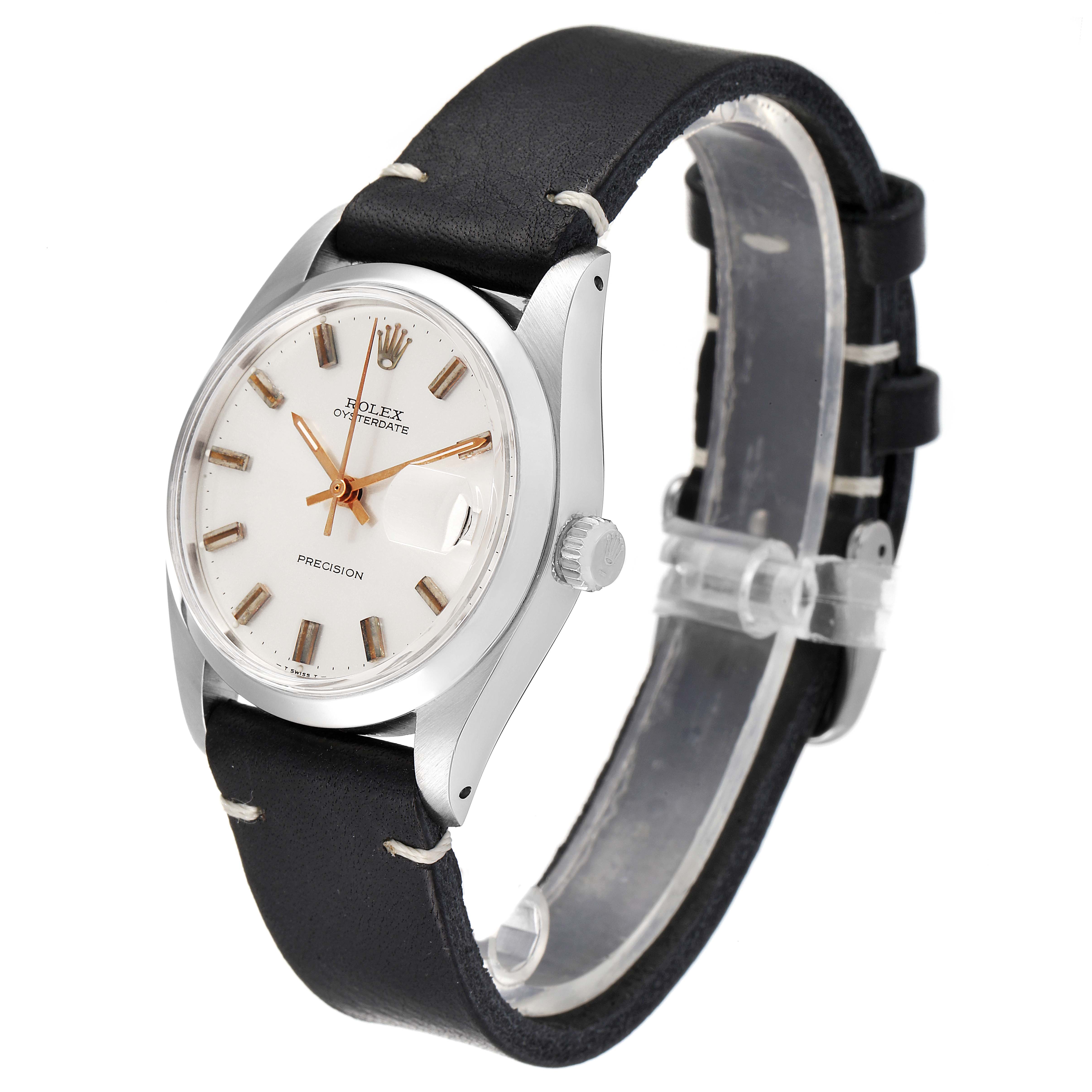 The Vintage Collection Rolex watch is shown at an angled side view, displaying the face, black strap, and crown.