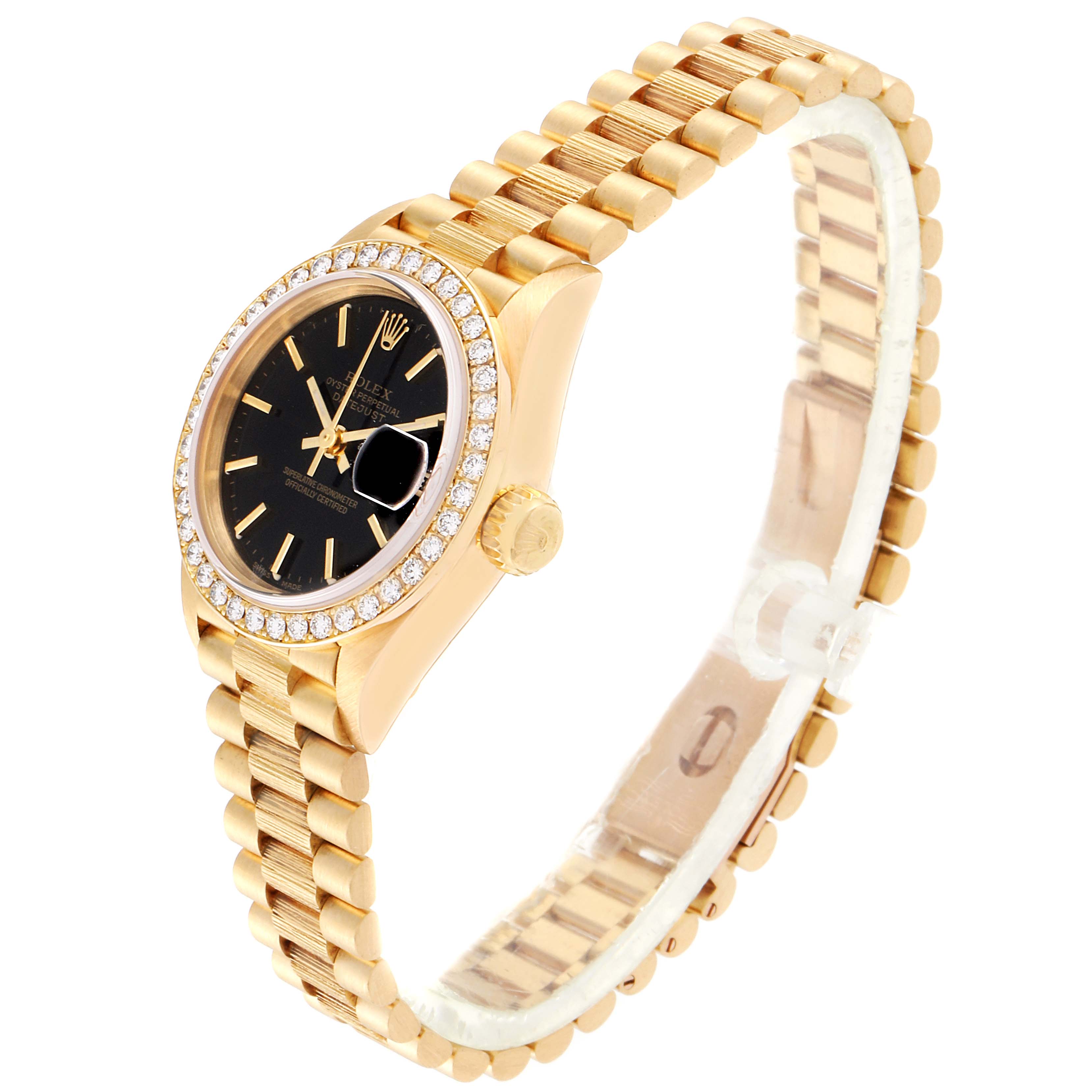 This image showcases the Rolex President 69288 Men
s Yellow Gold Black Dial 69288 Men
s Yellow Gold Black Dial model watch from an oblique angle, highlighting its gold bracelet, black dial, and diamond bezel.