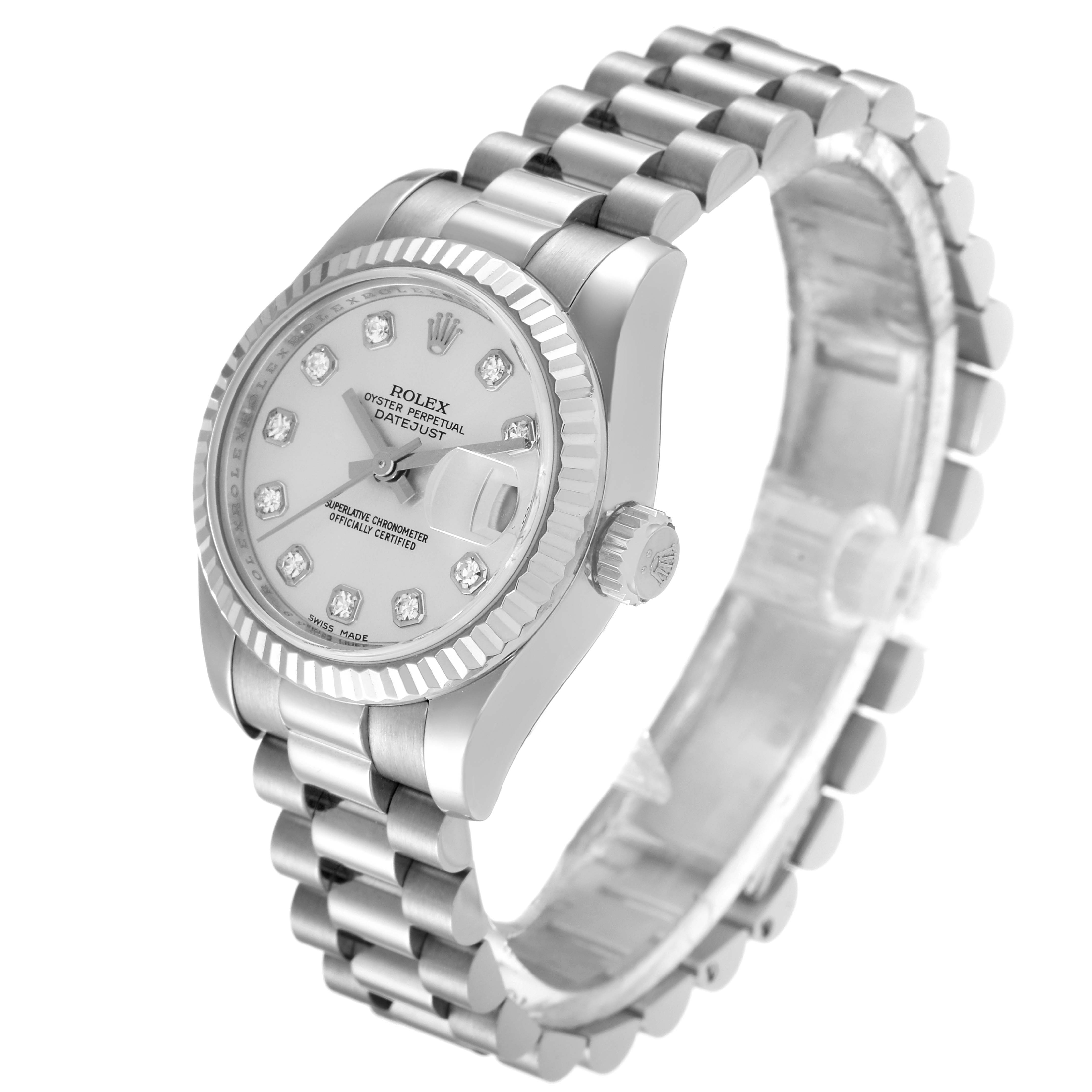 The image shows a President model Rolex watch from an angled view highlighting the dial, bezel, crown, and bracelet.