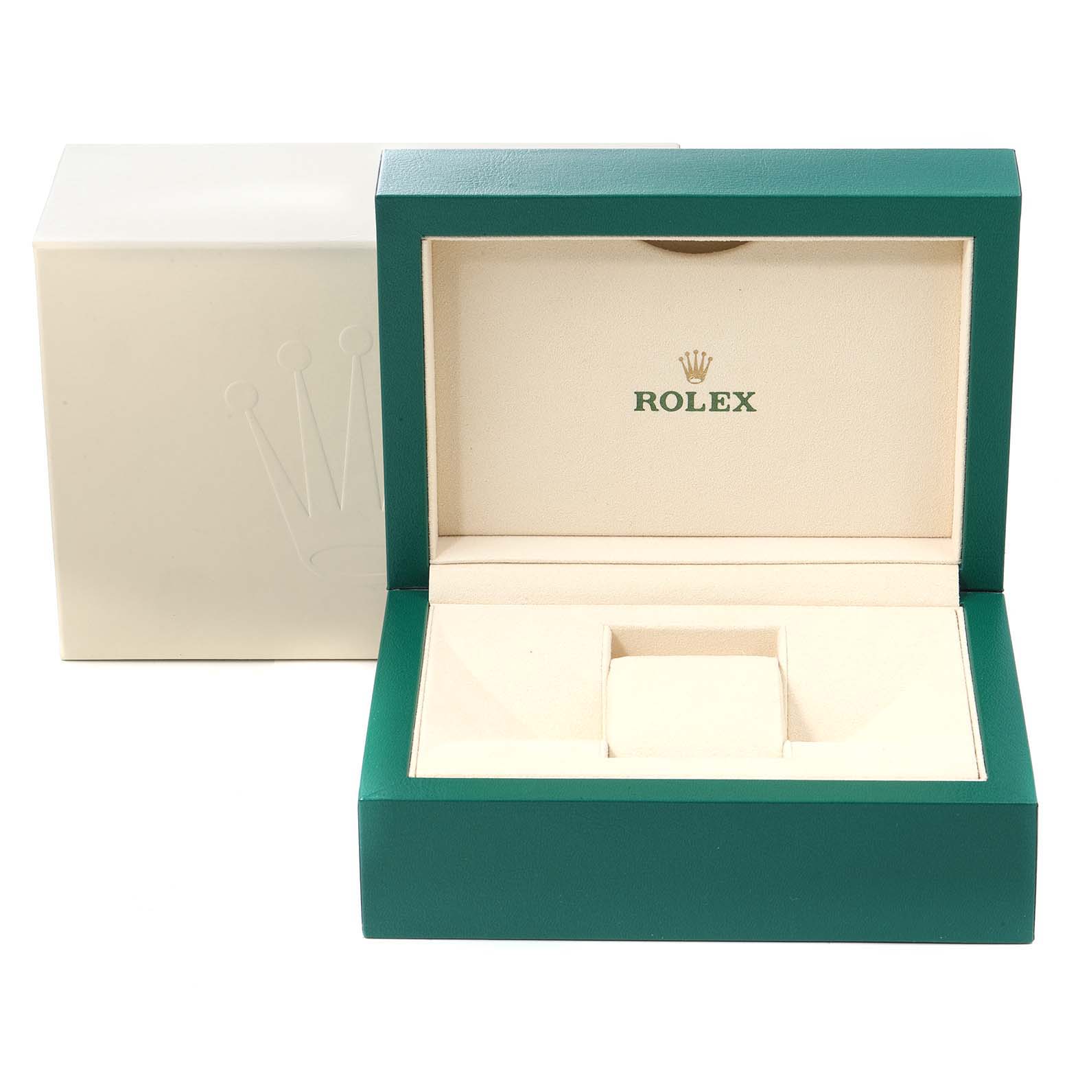 This is an empty Rolex Submariner 116610LV Men's Stainless Steel Green Dial 116610LV Men's Stainless Steel Green Dial watch box, featuring a green exterior and beige interior with the Rolex logo.