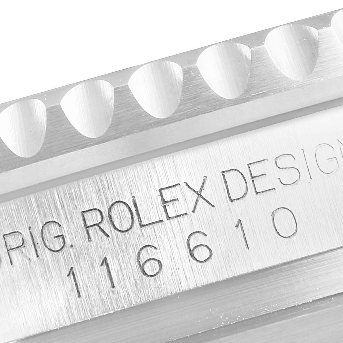 The image shows a close-up of the bezel and engraved case side of a Rolex Submariner 116610LV Men's Stainless Steel Green Dial 116610LV Men's Stainless Steel Green Dial 116610.