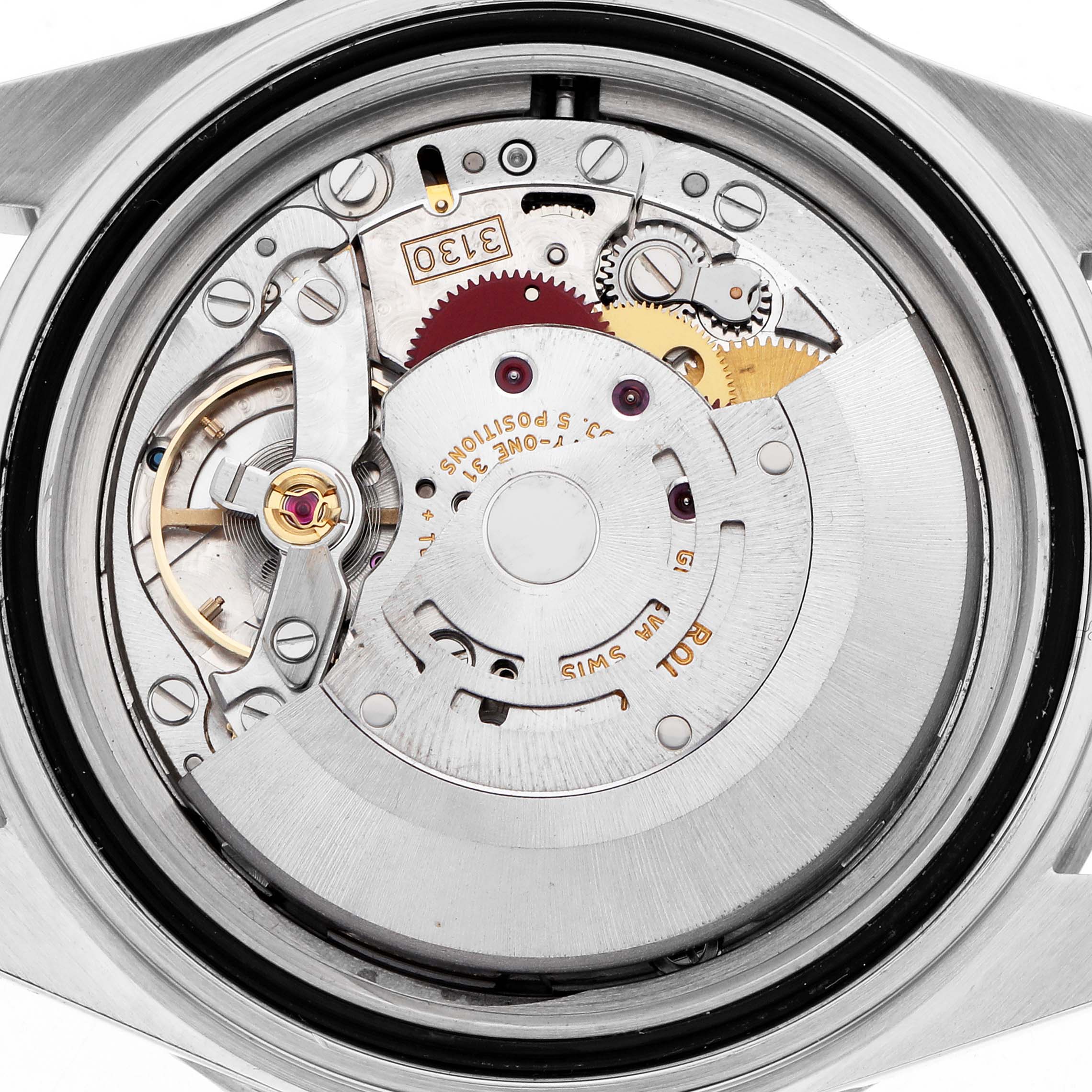 The image shows the movement of a Rolex Submariner 14060 Men
s Stainless Steel Black Dial from a back angle, revealing gears and components.