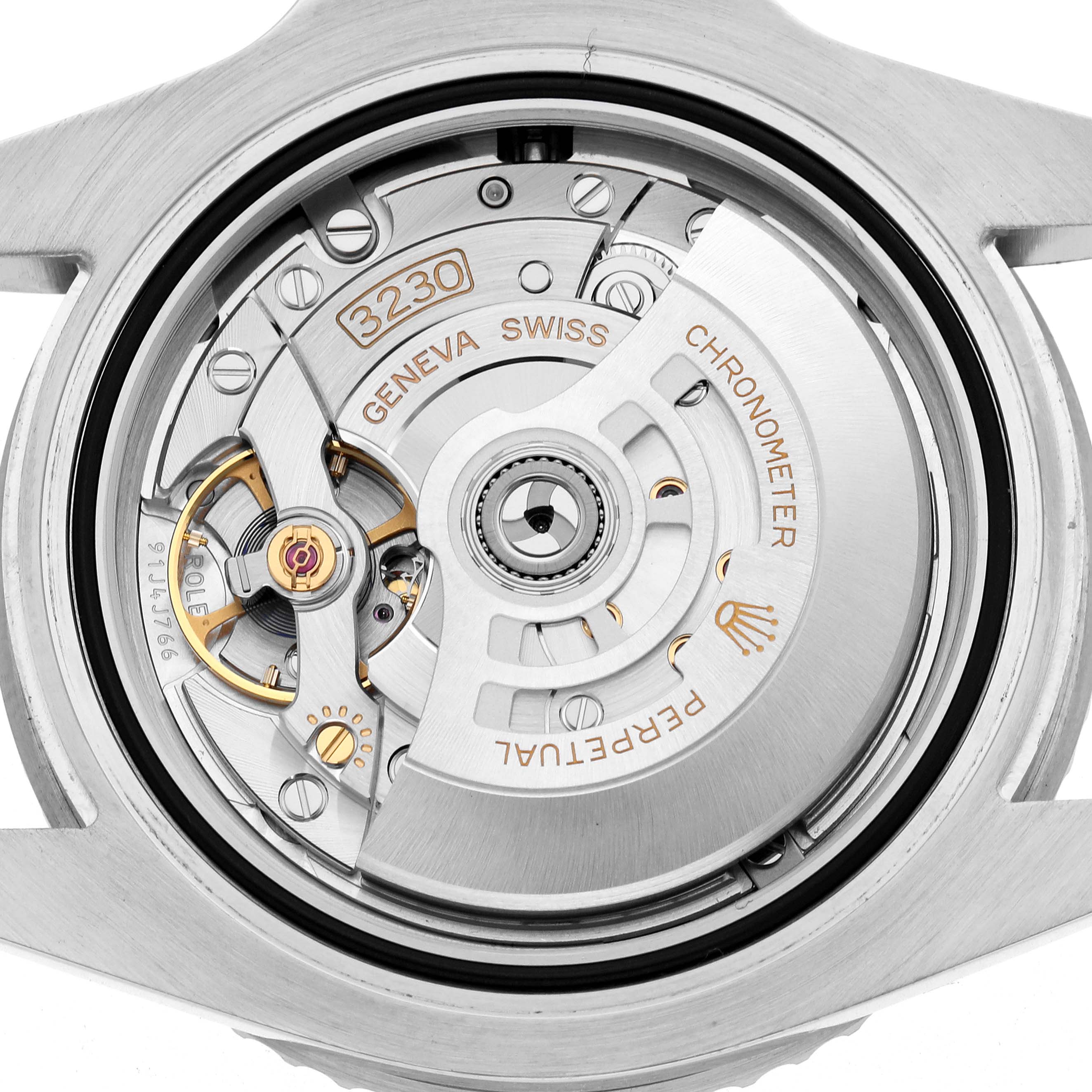 The image shows the inner movement of the Rolex Submariner 124060 Men
s Stainless Steel Black Dial, focusing on the mechanism and rotor from a top view.