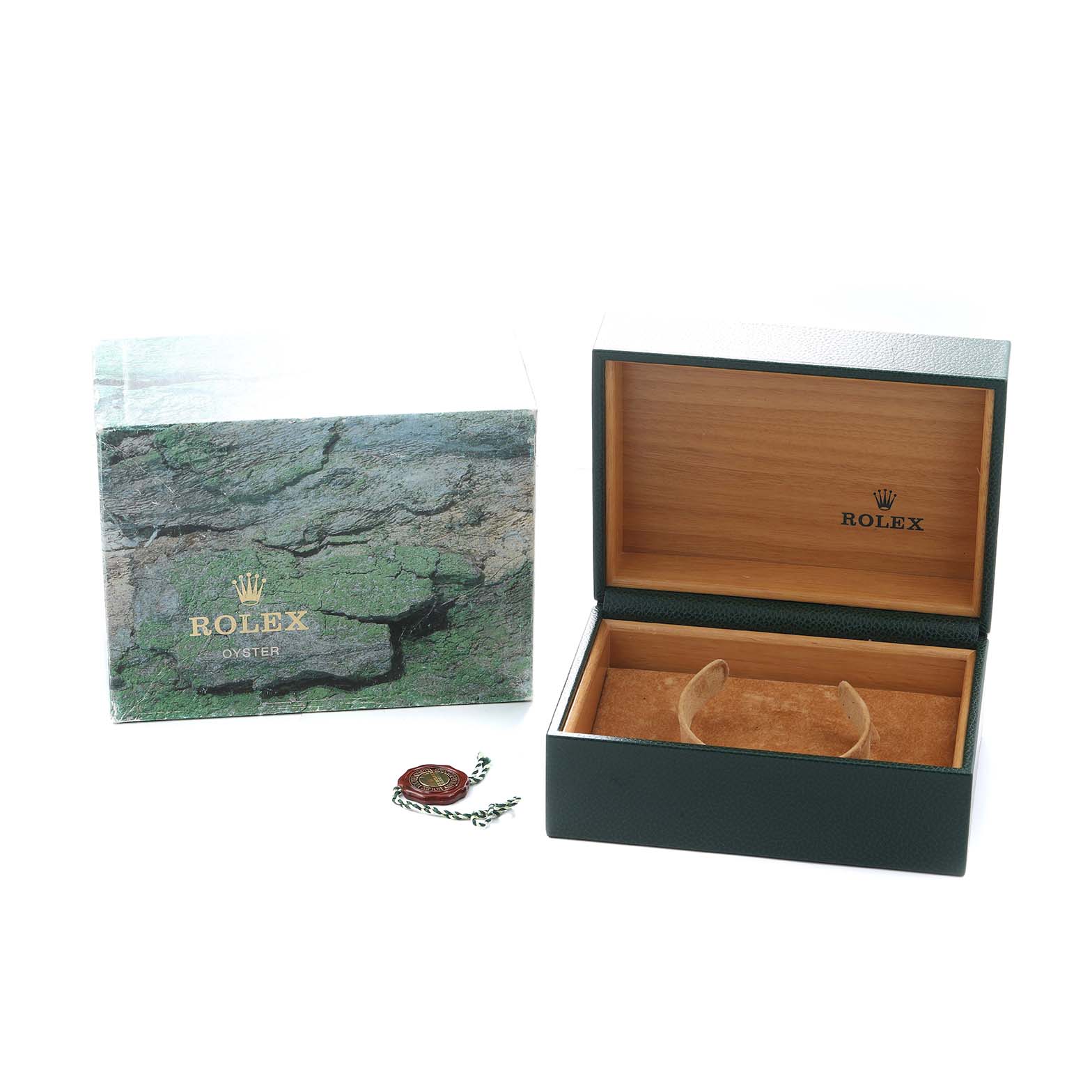 The image shows a Rolex Submariner 16613 Men
s Steel and Gold (two tone) Black Dial box, cushion, and tag, with the box lid open and displaying the brand logo inside.