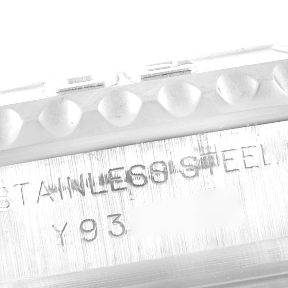 This close-up image shows the stainless steel casing of a Rolex Yacht-Master 169622 Women's Stainless Steel Silver Dial 169622 Women's Stainless Steel Silver Dial watch, focusing on the engraved text.