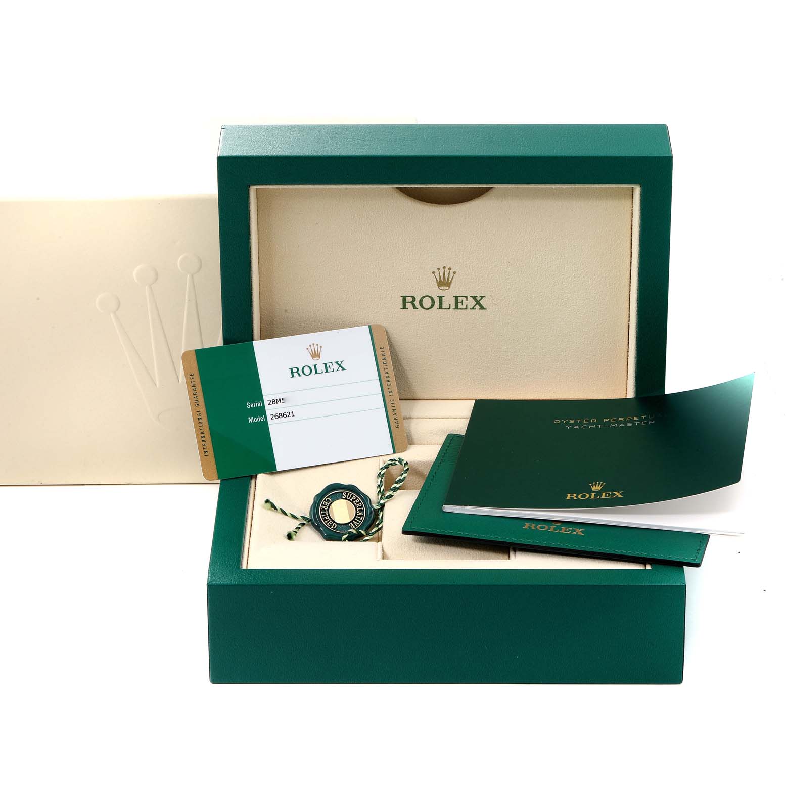 The image shows the accessories and packaging for a Rolex Yacht-Master 268621 Men's Steel and Gold (two tone) Brown Dial 268621 Men's Steel and Gold (two tone) Brown Dial model, including the box, booklet, card, and tag.