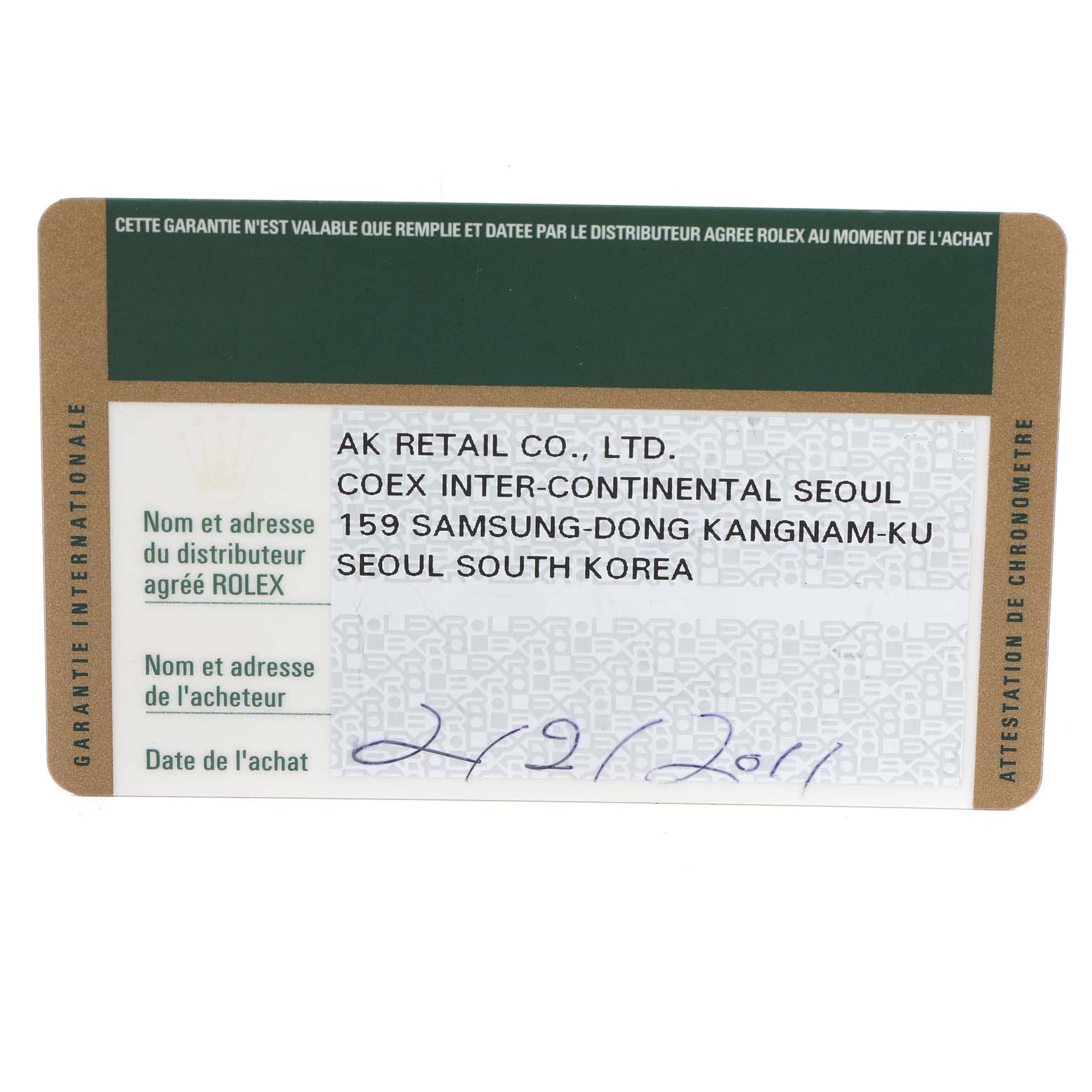 The image shows a close-up of a warranty card for a Rolex Yacht-Master 16622 Men
s Stainless Steel Silver Dial 16622 Men
s Stainless Steel Silver Dial watch.