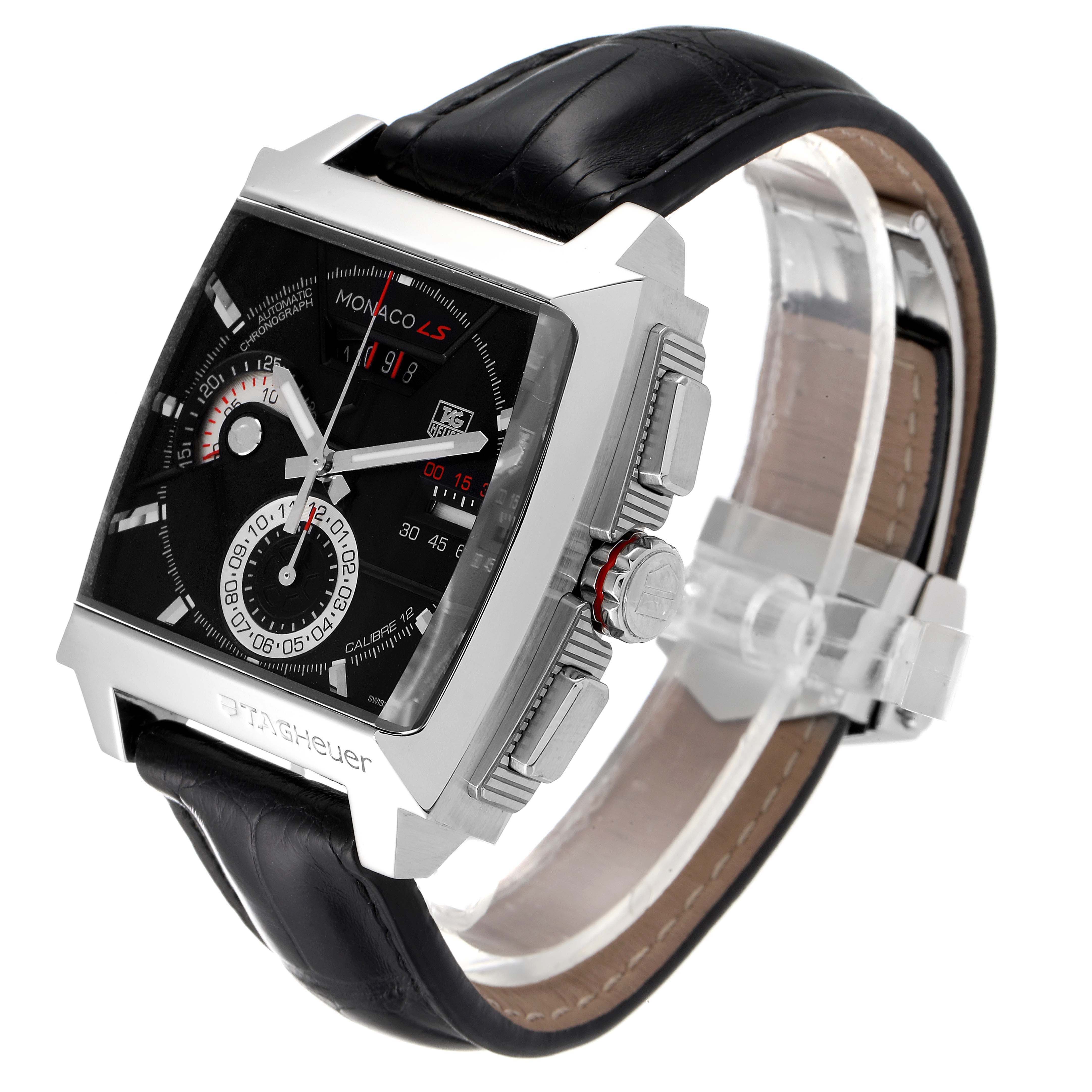 This image shows a side angle view of the Monaco model by Tag Heuer, highlighting its face, crown, and black leather strap.