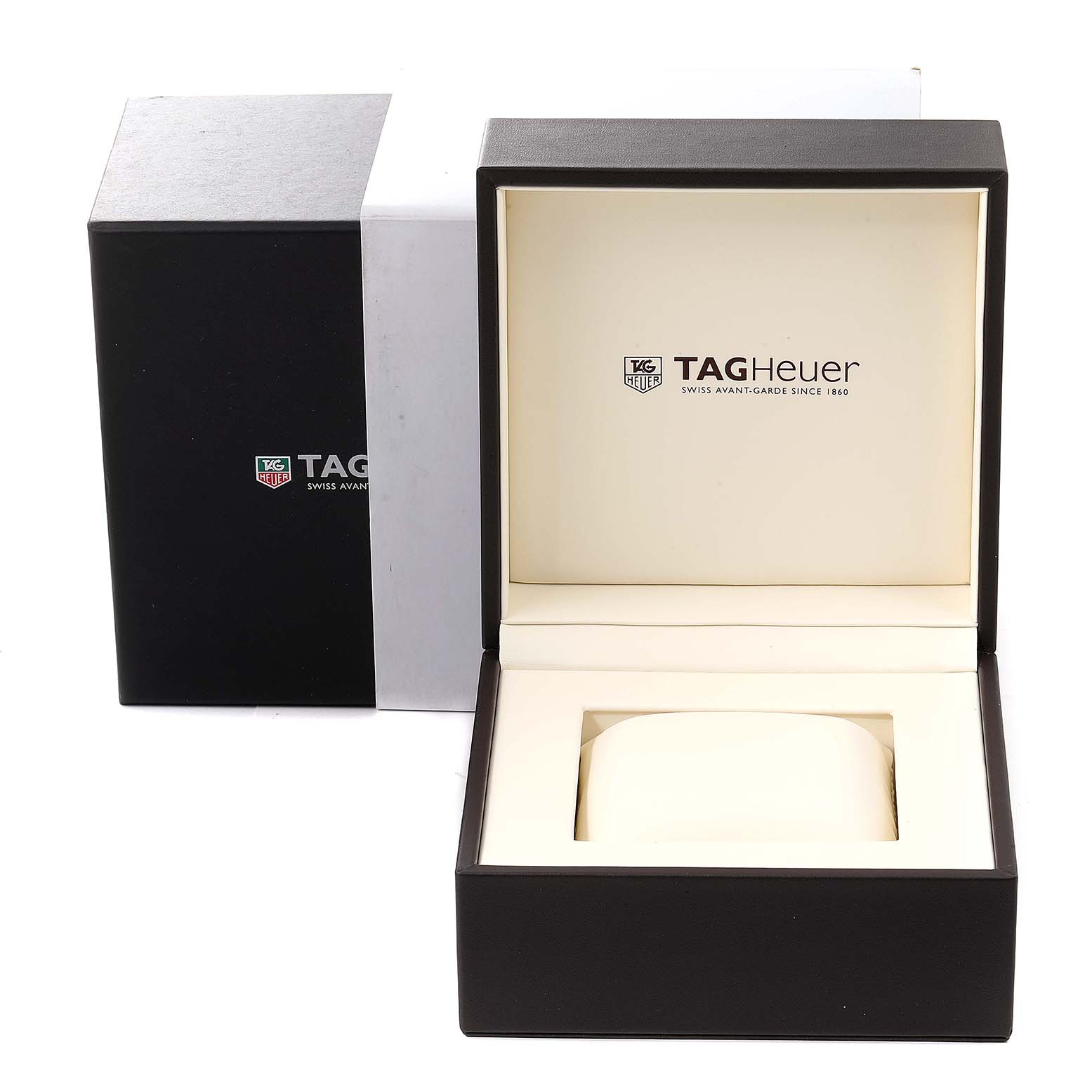 The image shows the open box of a Tag Heuer Monaco CAL2110.FC6257 Men's Stainless Steel Black Dial CAL2110.FC6257 Men's Stainless Steel Black Dial watch, with the brand's logo visible inside the lid and an outer box in the background.