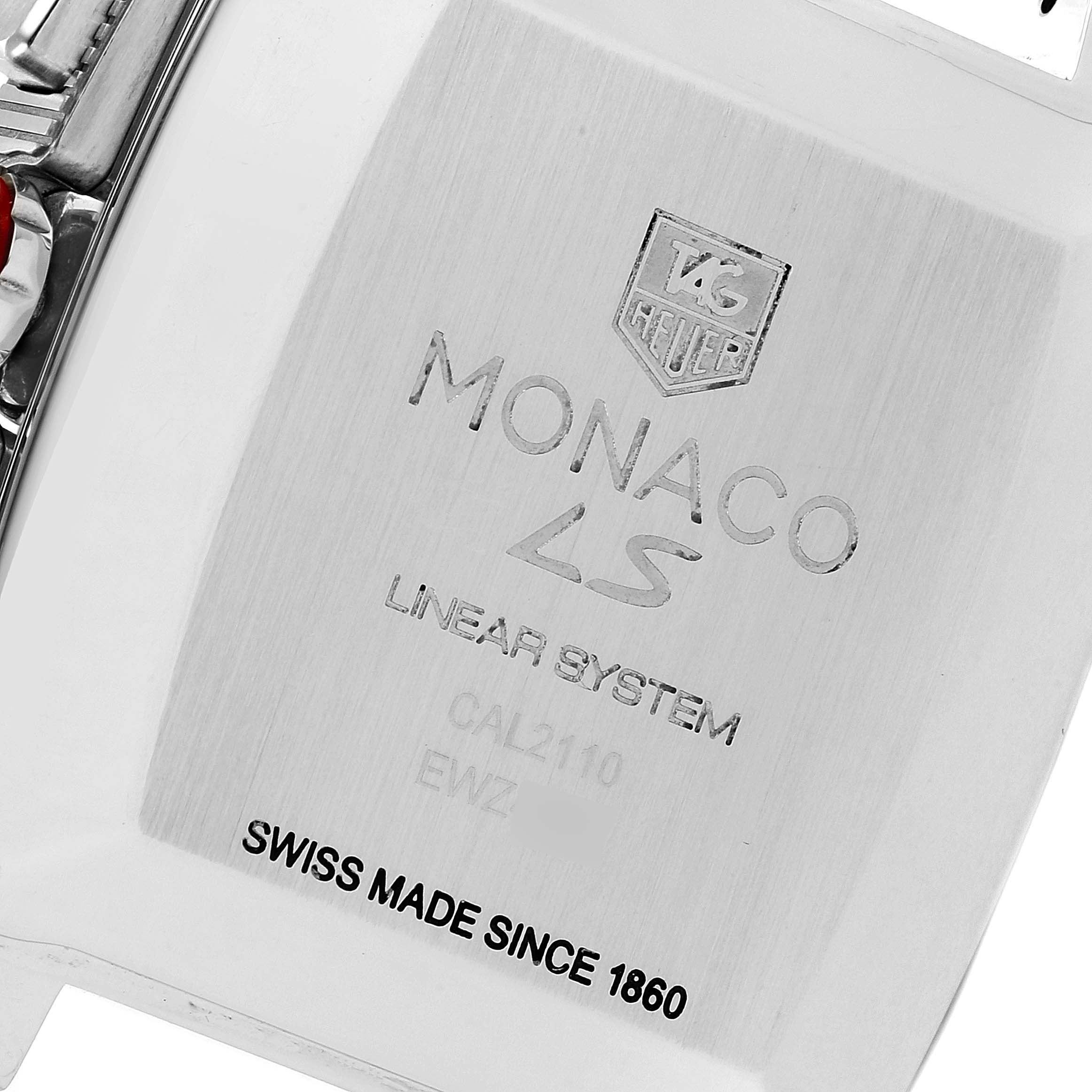 This image shows the back of a Tag Heuer Monaco CAL2110.FC6257 Men's Stainless Steel Black Dial CAL2110.FC6257 Men's Stainless Steel Black Dial LS watch detailing the model information and branding.