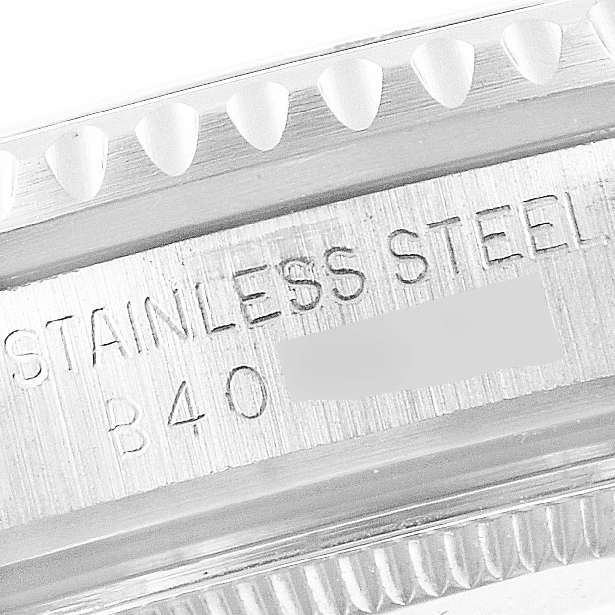 This image shows a close-up of the stainless steel bezel and engraving on the Prince model by Tudor.