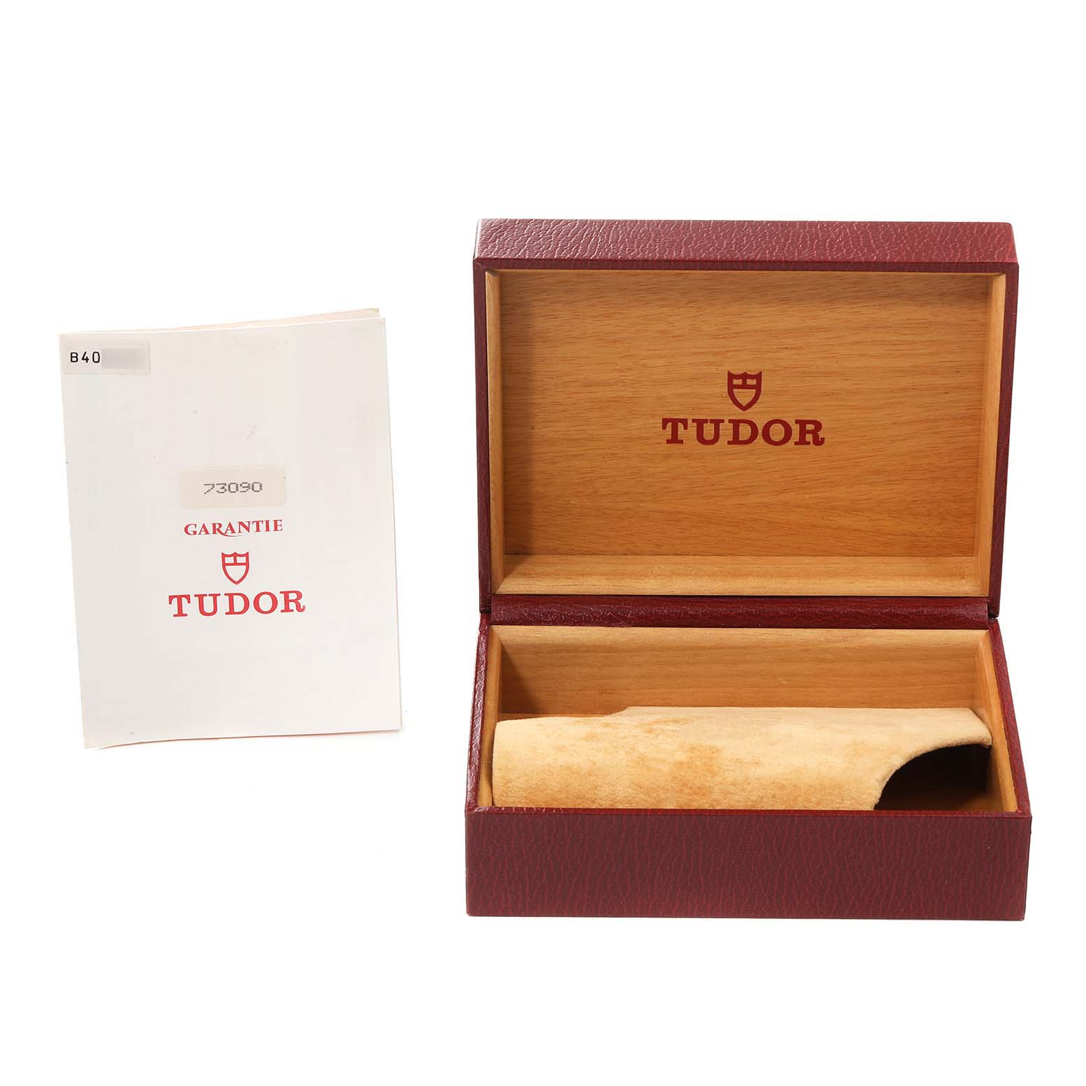 The image shows an open Tudor Prince 73090 Women's Stainless Steel Black Dial 73090 Women's Stainless Steel Black Dial watch box and a warranty booklet next to it.