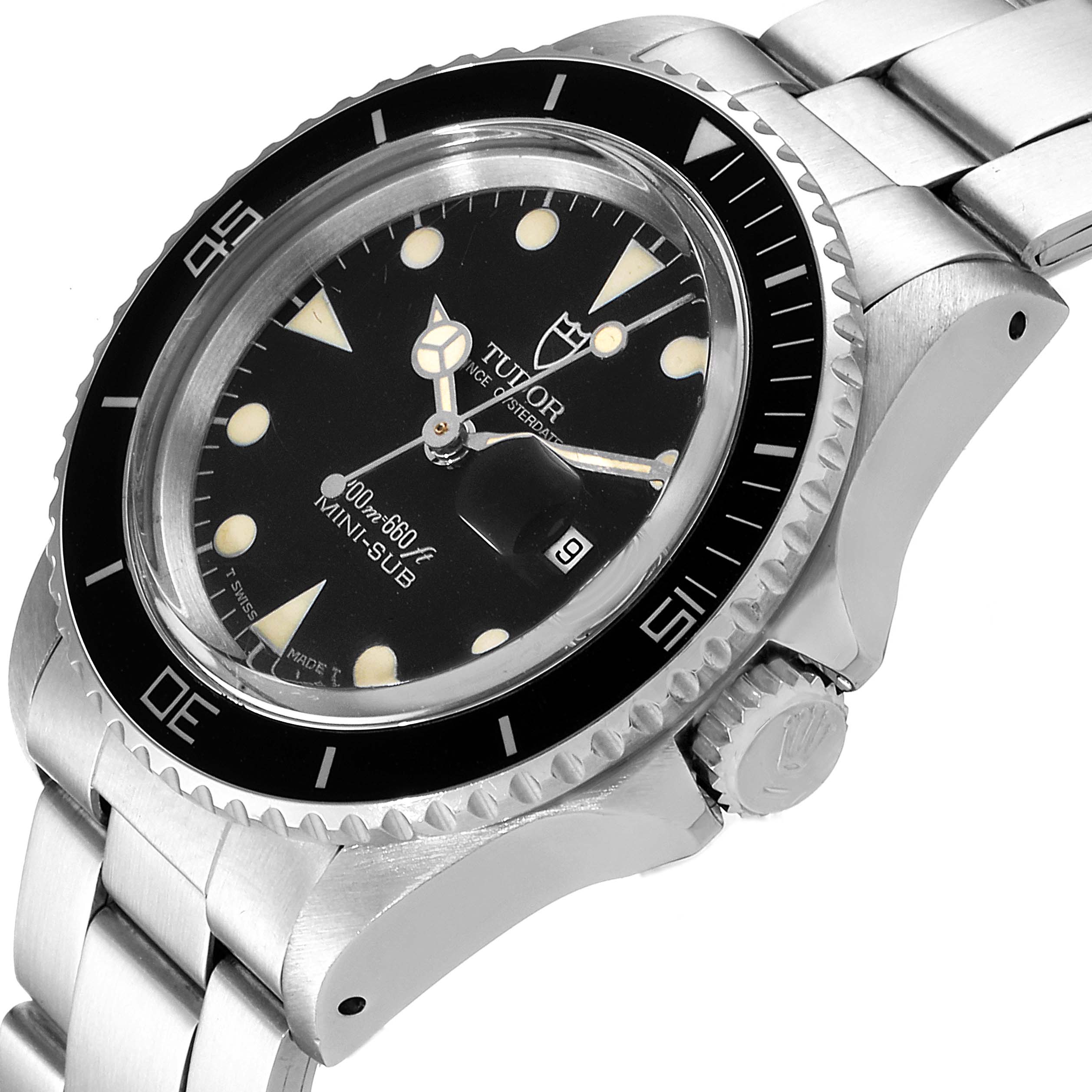 The image shows a Tudor Prince 73090 Women's Stainless Steel Black Dial 73090 Women's Stainless Steel Black Dial model watch from an oblique angle, highlighting its bezel, dial, crown, and metal bracelet.