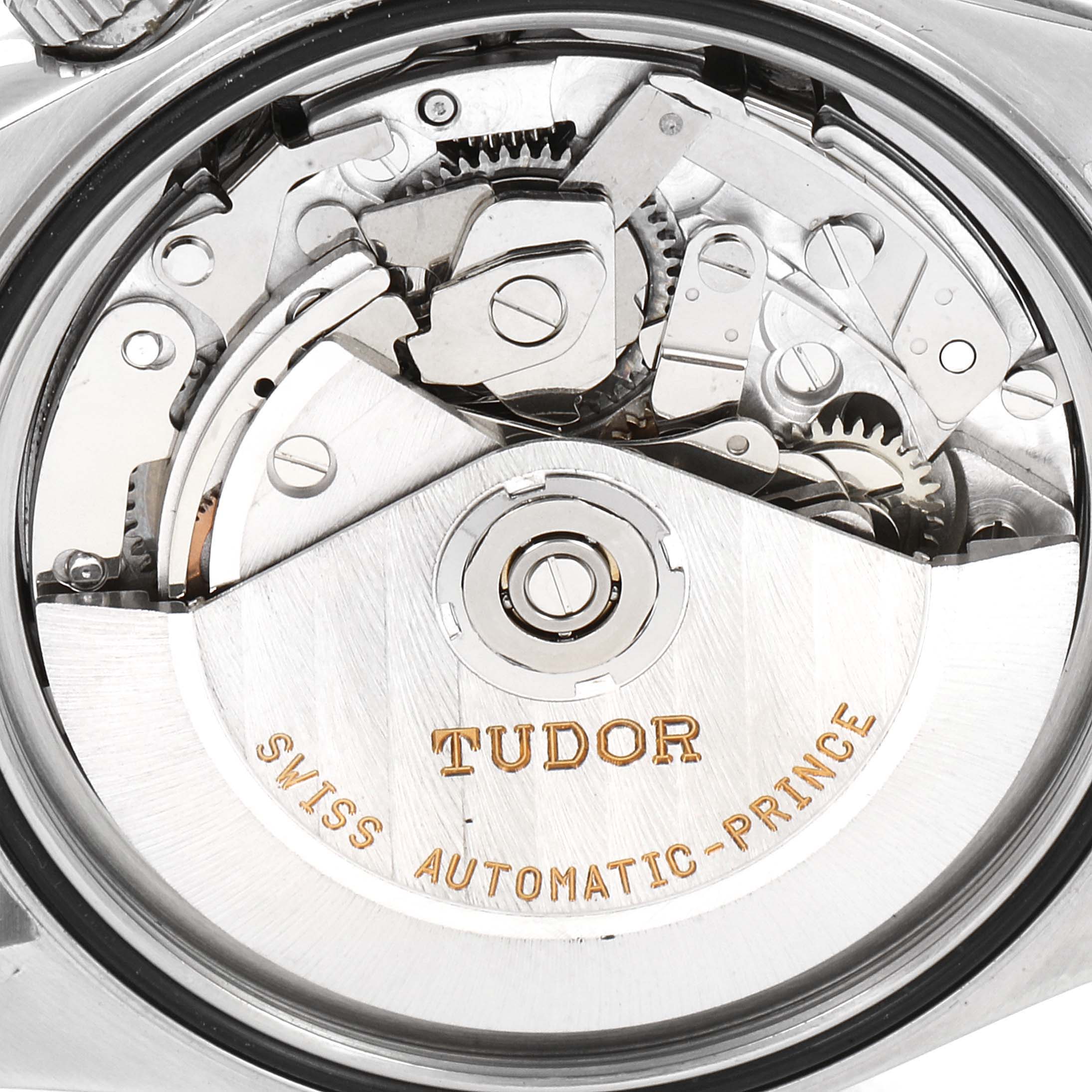 The image shows the internal mechanism of the Tudor Prince 79280 Men
s Stainless Steel Black Dial 79280 Men
s Stainless Steel Black Dial model watch, focusing on the movement and gears.