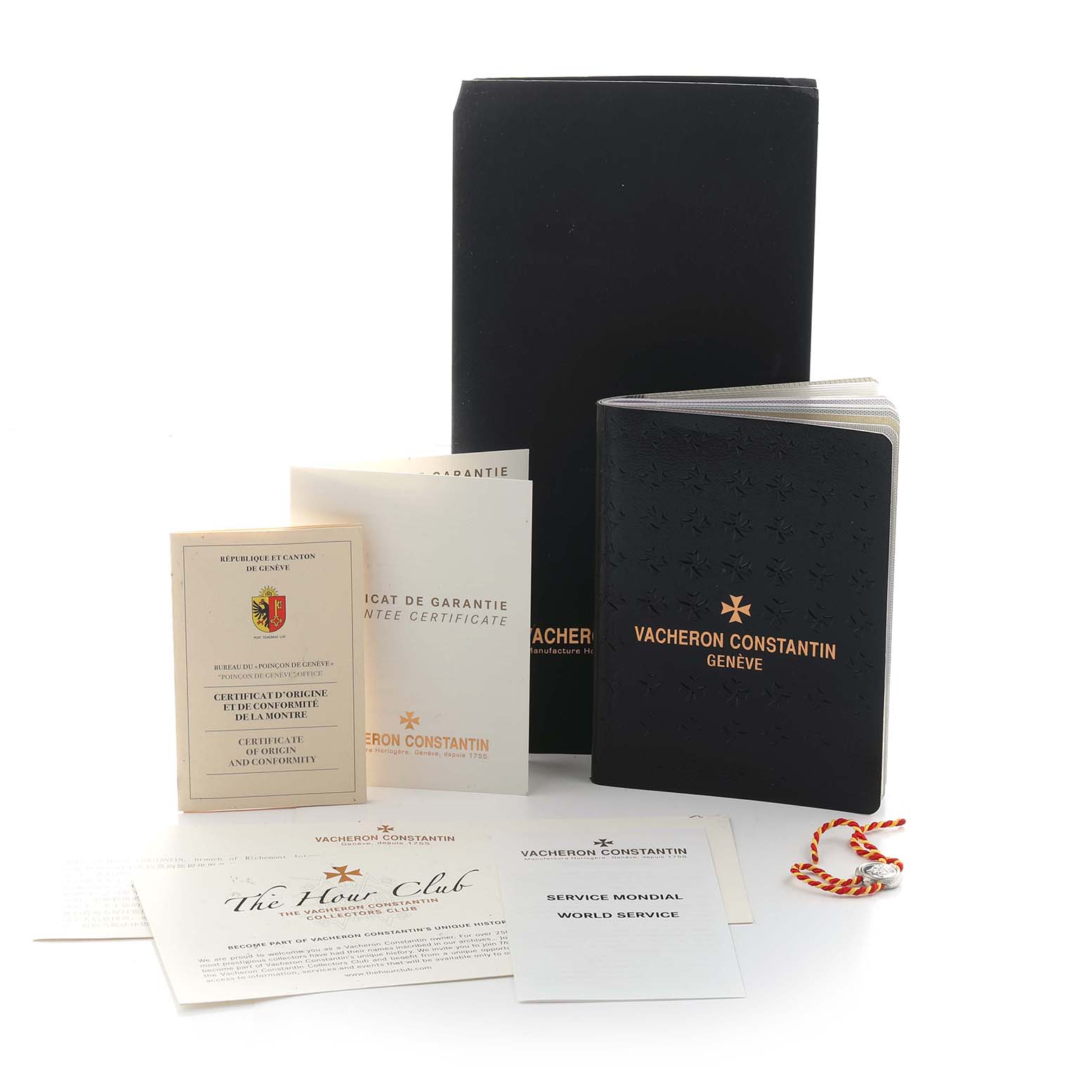 The image shows Vacheron Constantin Traditionnelle 87172 Men
s Rose Gold Silver Dial model accessories including a box, booklet, warranty certificate, and service documents.