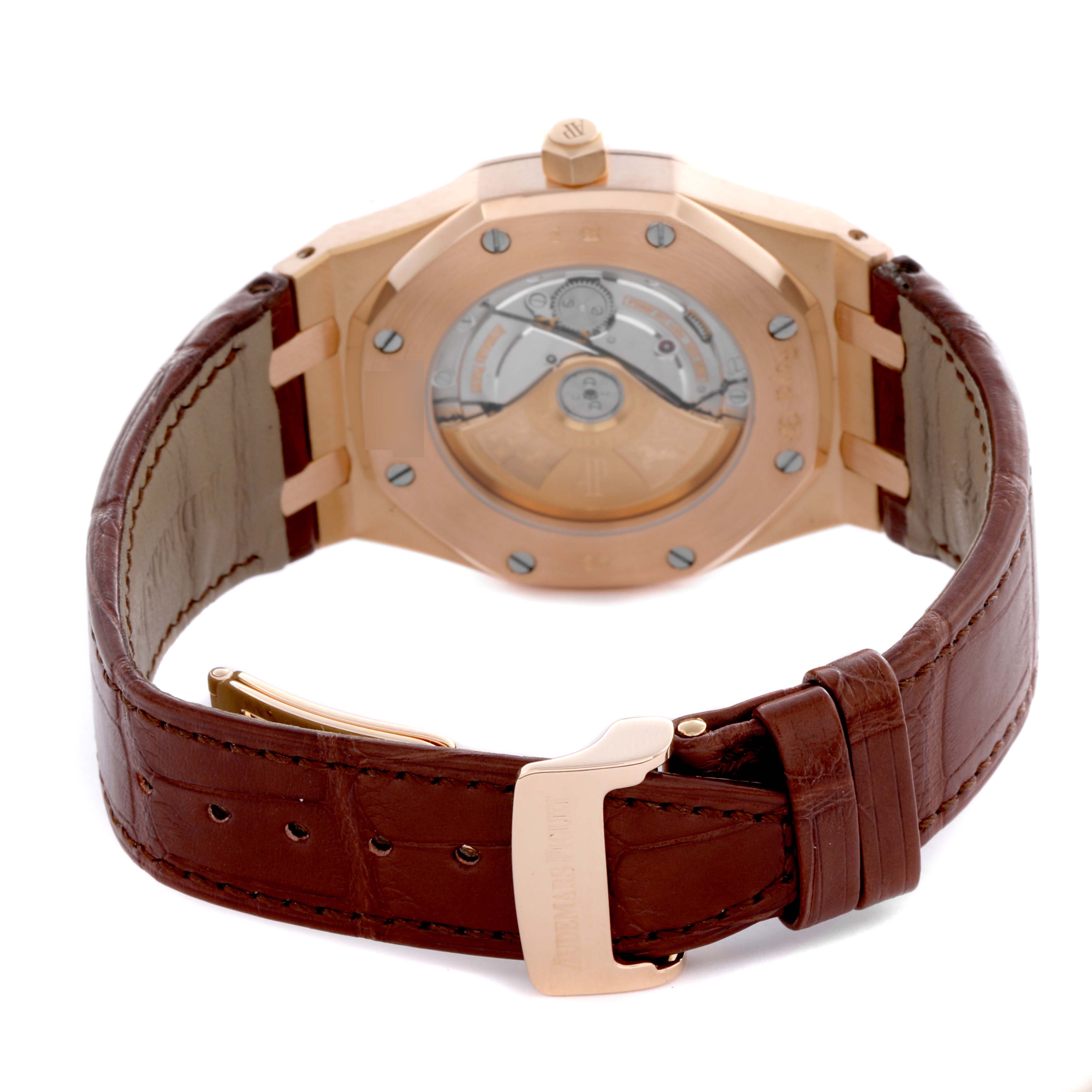 The Audemars Piguet Royal Oak 15400OR Men's Rose Gold Silver Dial watch is shown from the back, highlighting its exhibition case back and leather strap.