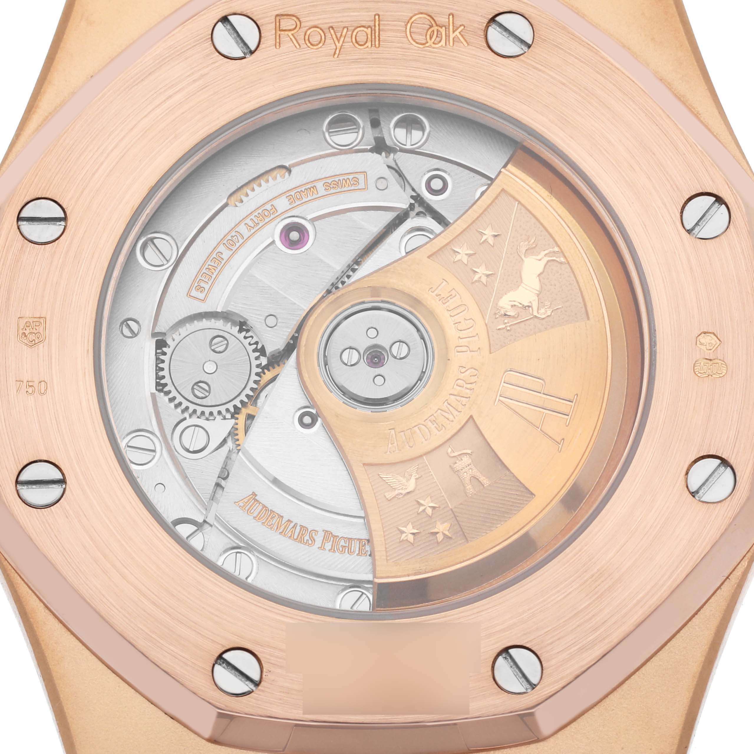 The image shows the back of a Royal Oak by Audemars Piguet, featuring its movement and rotor through a transparent case back.
