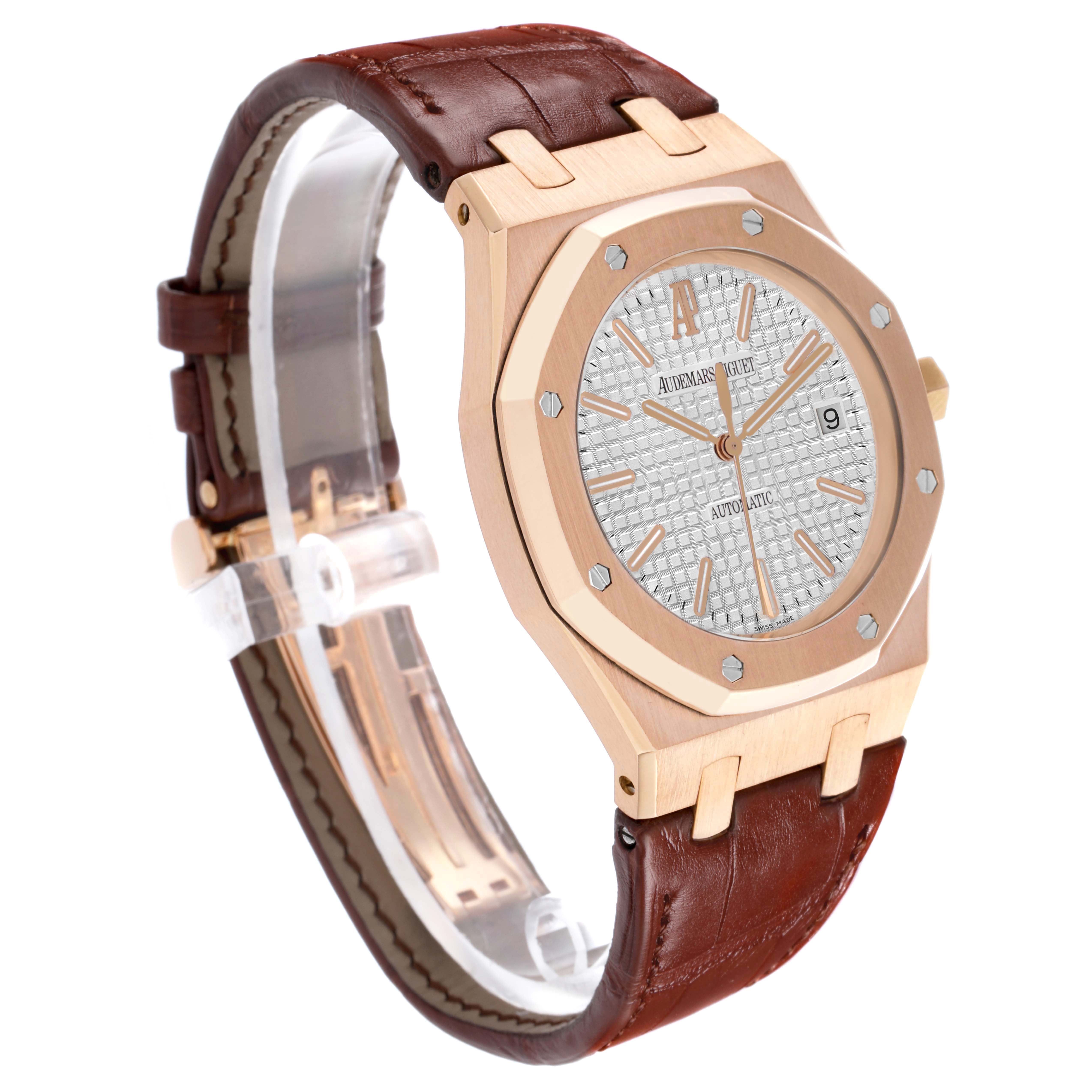 The Royal Oak by Audemars Piguet is shown in a three-quarter angle, highlighting its octagonal bezel, dial, and leather strap.