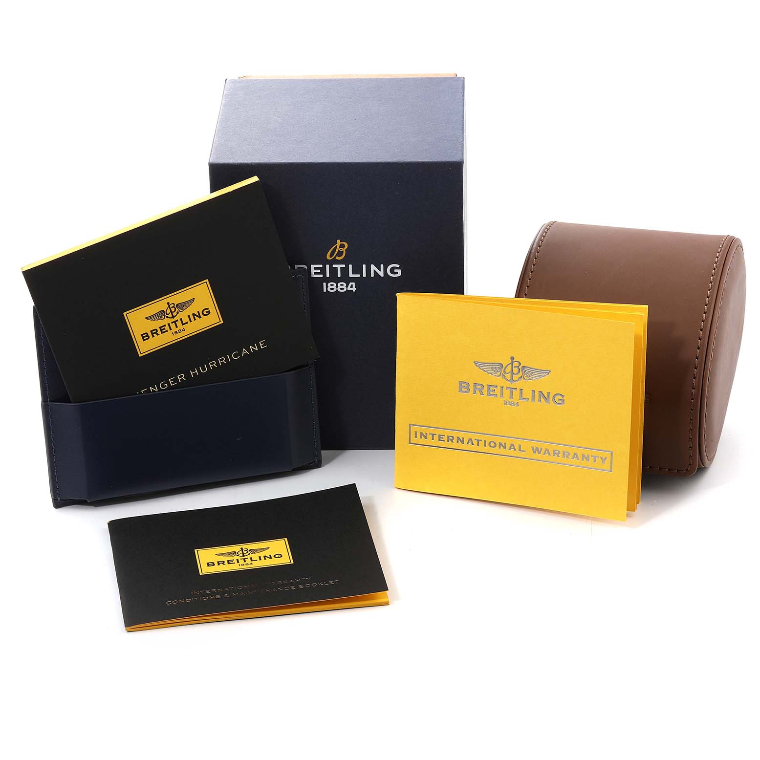 The image shows the packaging, manuals, warranty card, and leather case for a Breitling Avenger XB1210E41B1S1 Men's Titanium Black Dial XB1210E41B1S1 Men's Titanium Black Dial watch.