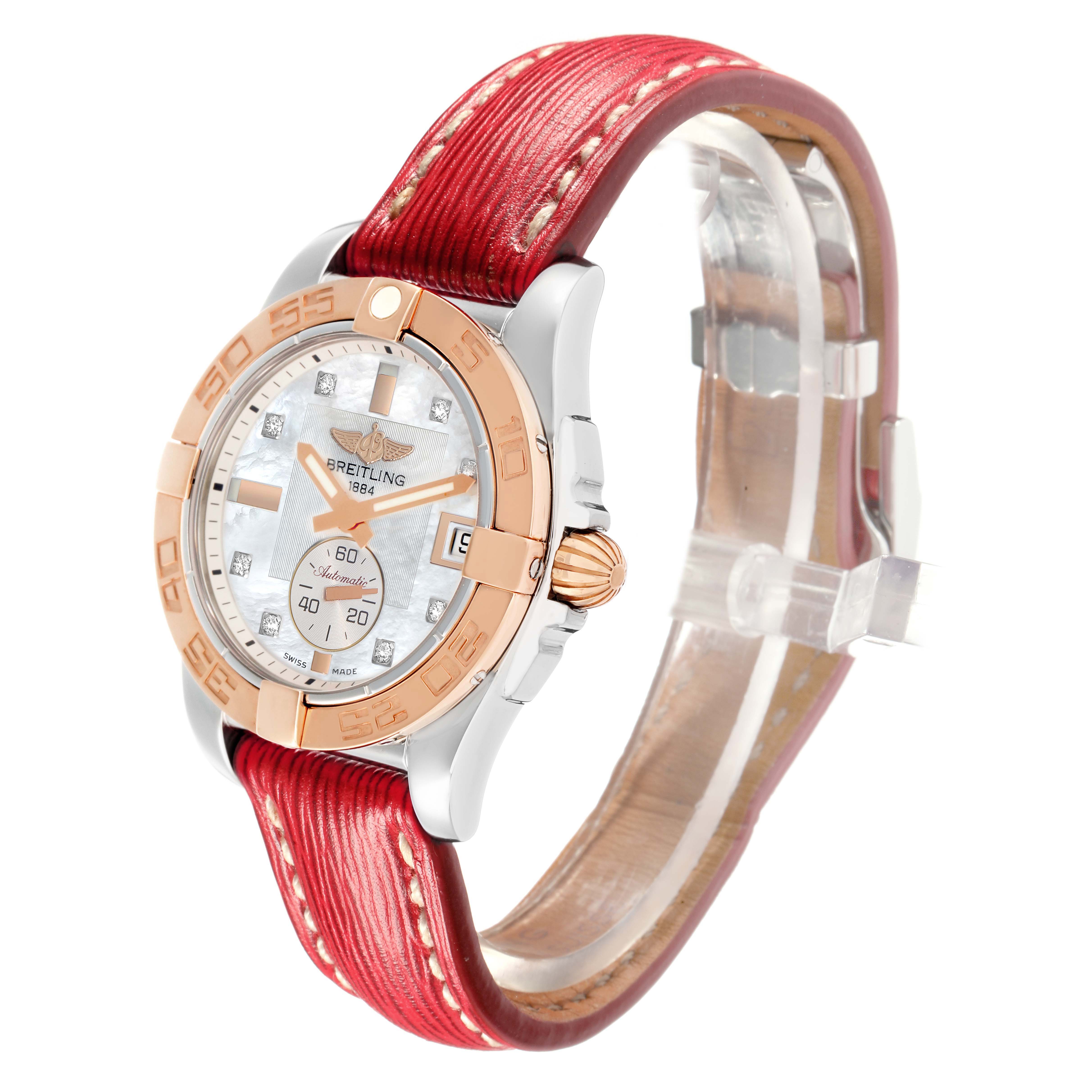 The Breitling Galactic C37330 Men
s Steel and Gold (two tone) Mother of Pearl Dial watch is shown at a 3/4 angle, highlighting its face, bezel, crown, and red leather strap.