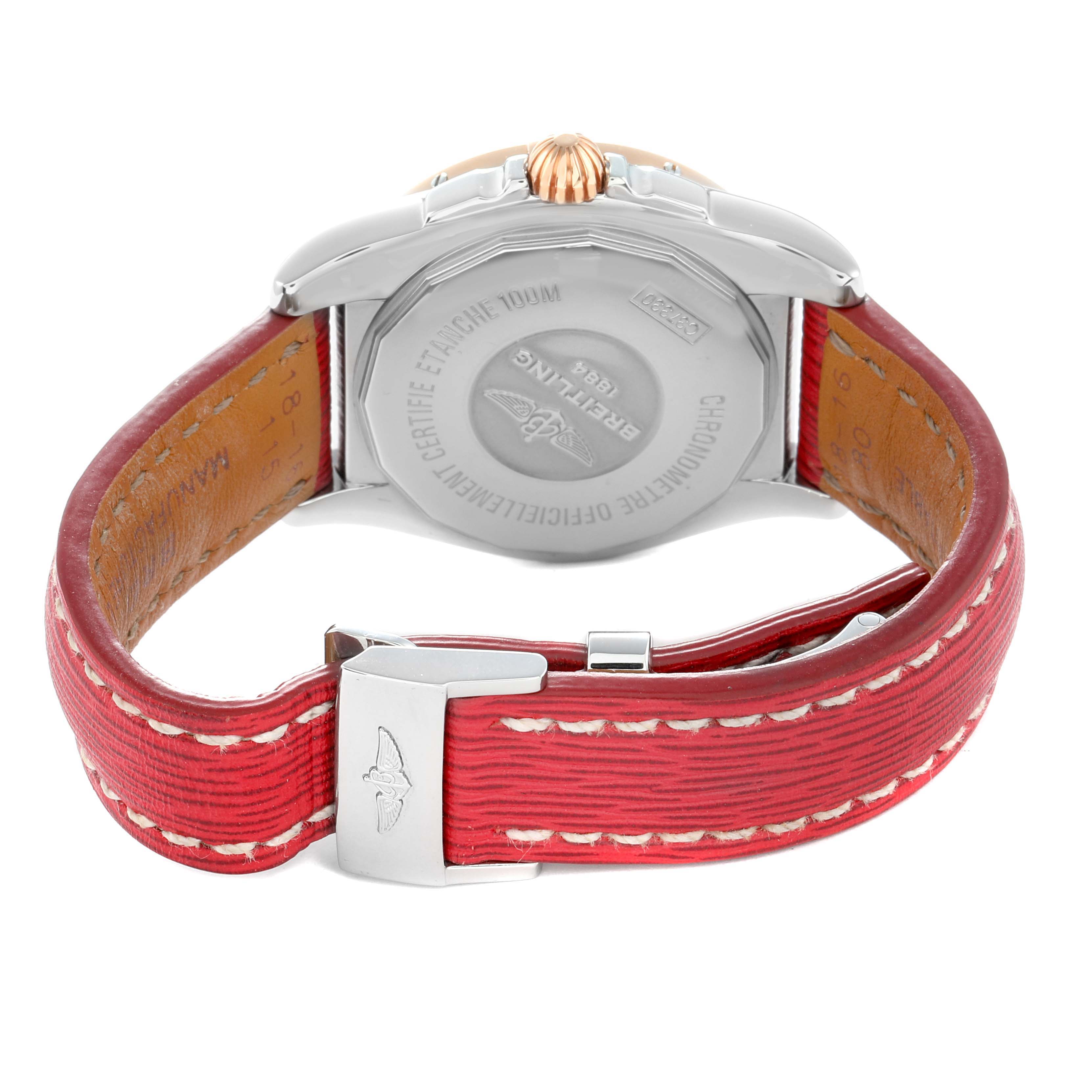 The image shows the back view of a Breitling Galactic C37330 Men
s Steel and Gold (two tone) Mother of Pearl Dial watch, highlighting the case back and red leather strap with a metal clasp.