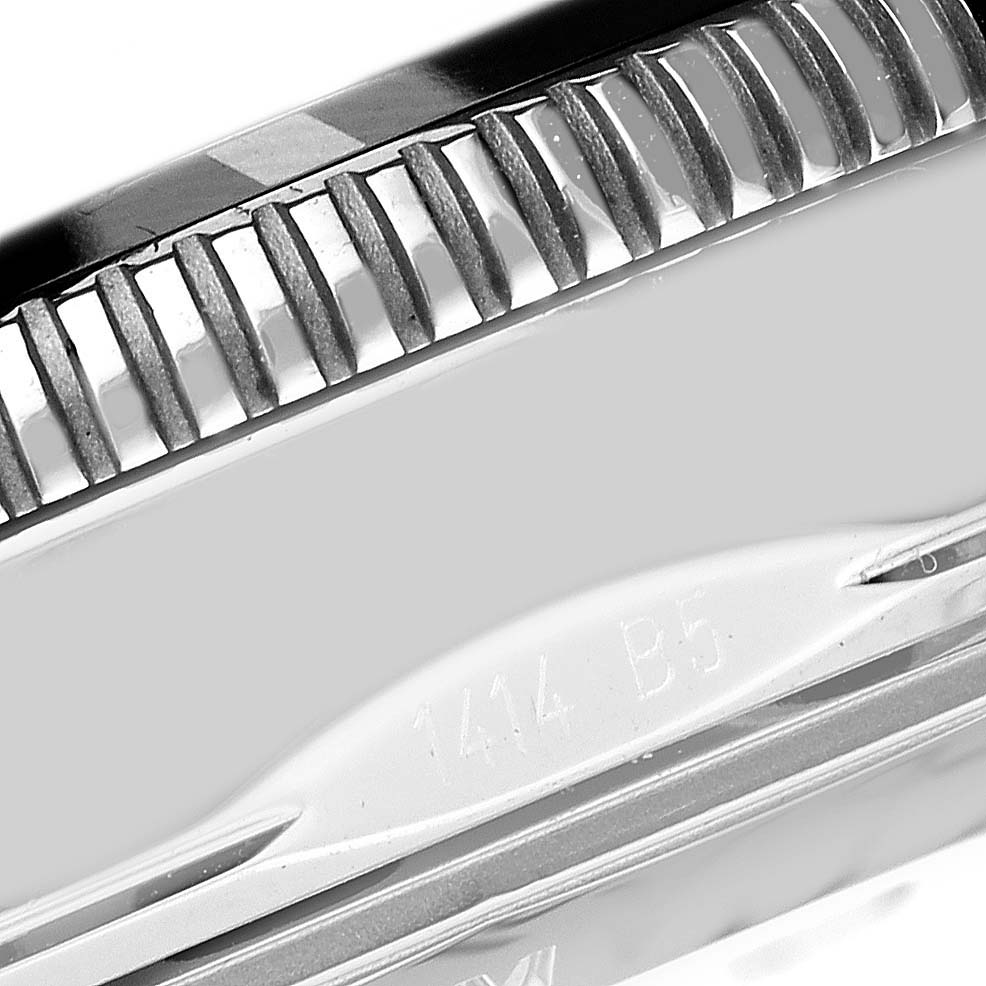 The image shows a close-up side view of the bezel and part of the case with markings on a Breitling Superocean A17321 Men
s Stainless Steel Silver Dial A17321 Men
s Stainless Steel Silver Dial watch.