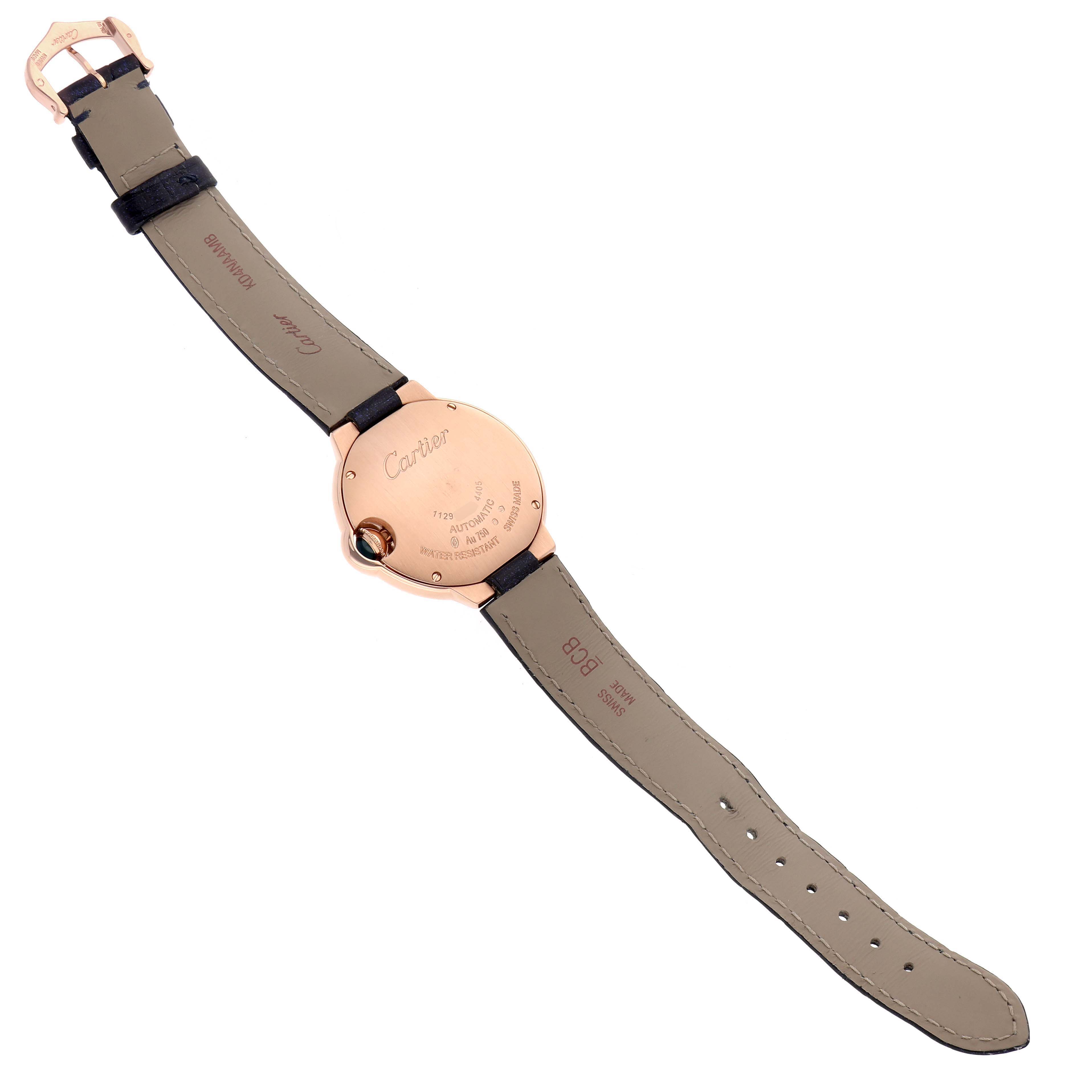 The image shows the back view of a Cartier Ballon Bleu WGBB0052 Men
s Rose Gold Silver Dial watch, highlighting the case back and leather strap.