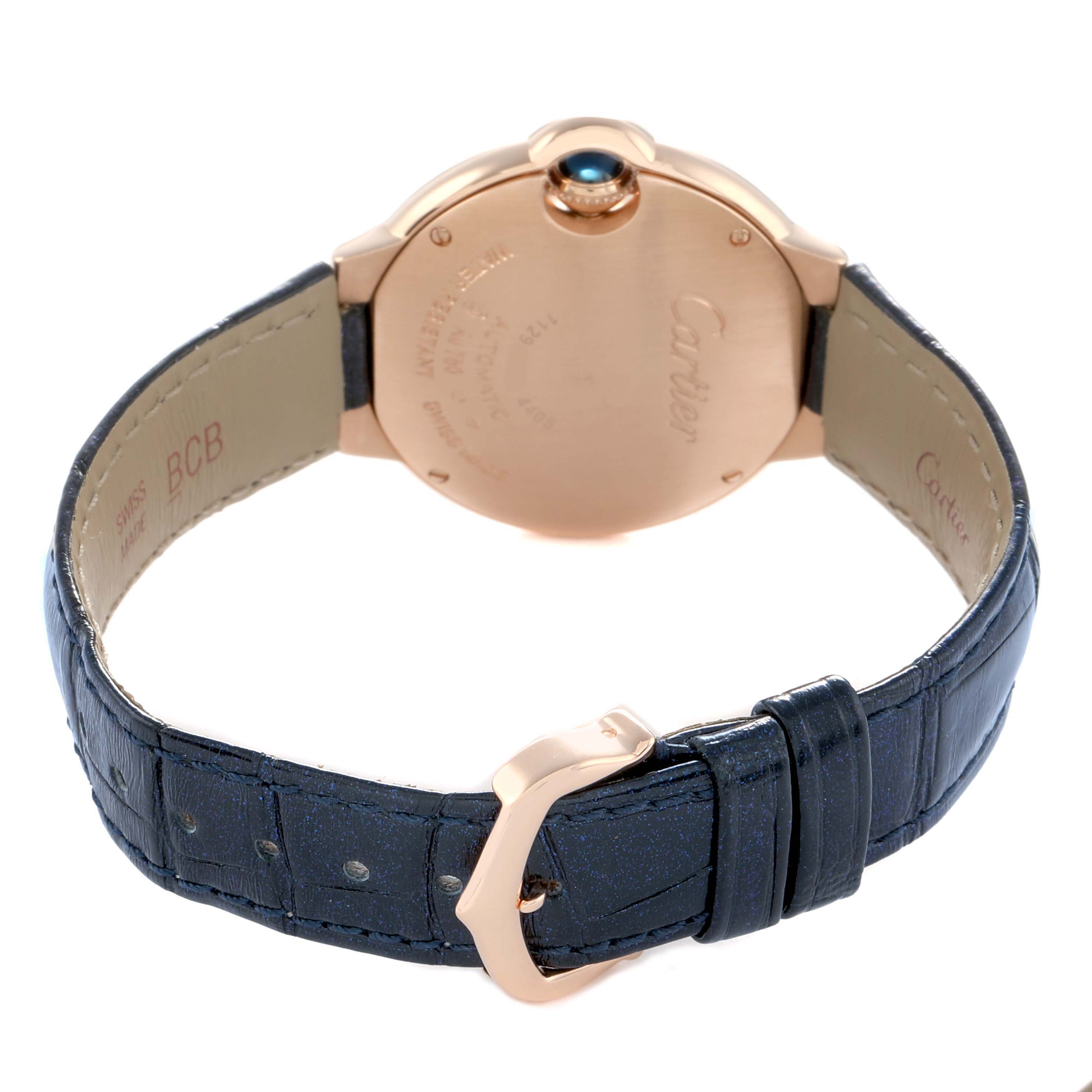 The image shows the back of a Cartier Ballon Bleu WGBB0052 Men
s Rose Gold Silver Dial watch, highlighting the case back, crown, and blue leather strap with buckle.