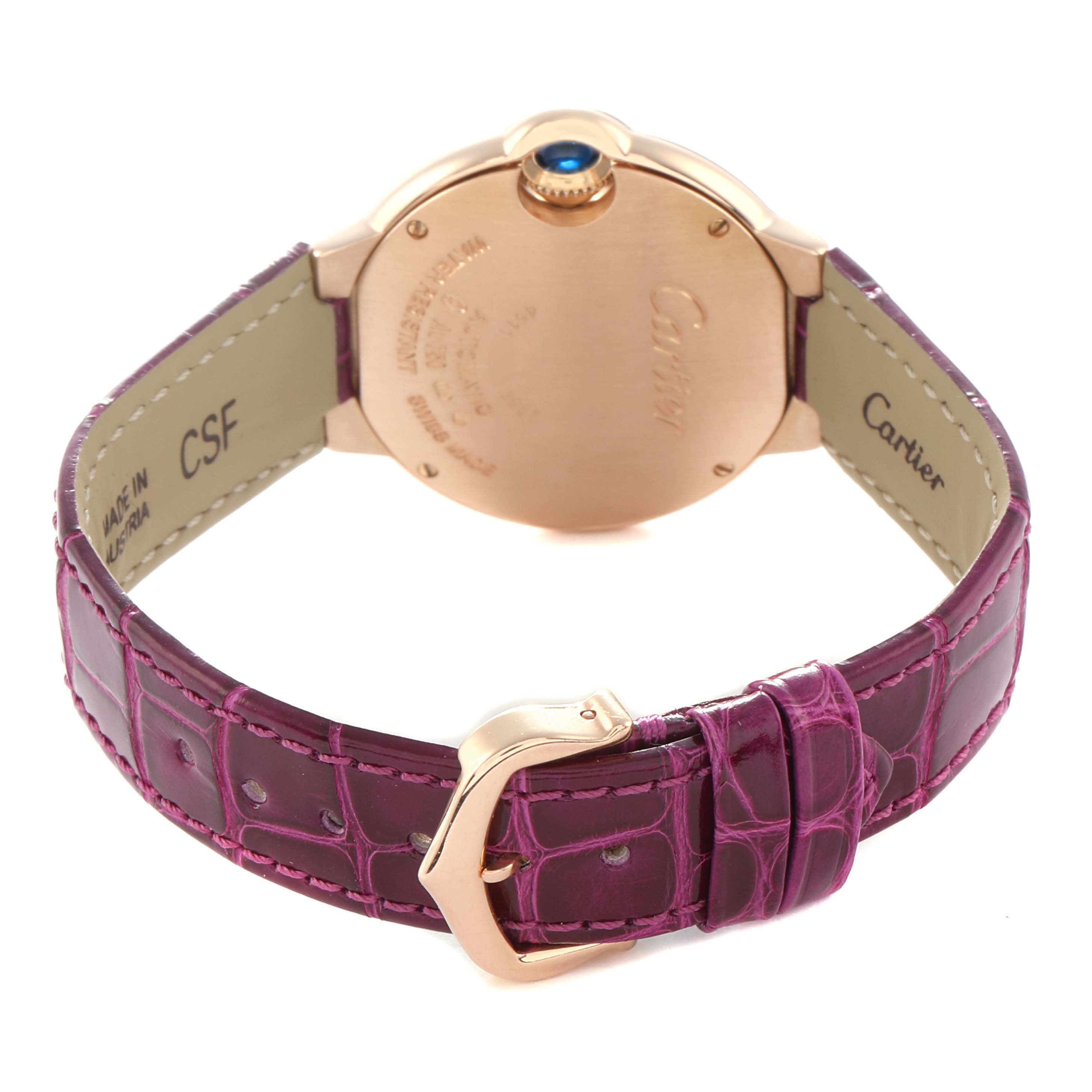 The image shows the back of a Cartier Ballon Bleu WE902063 Women
s Rose Gold Silver Dial watch, highlighting the case back, strap, and buckle from a rear angle.