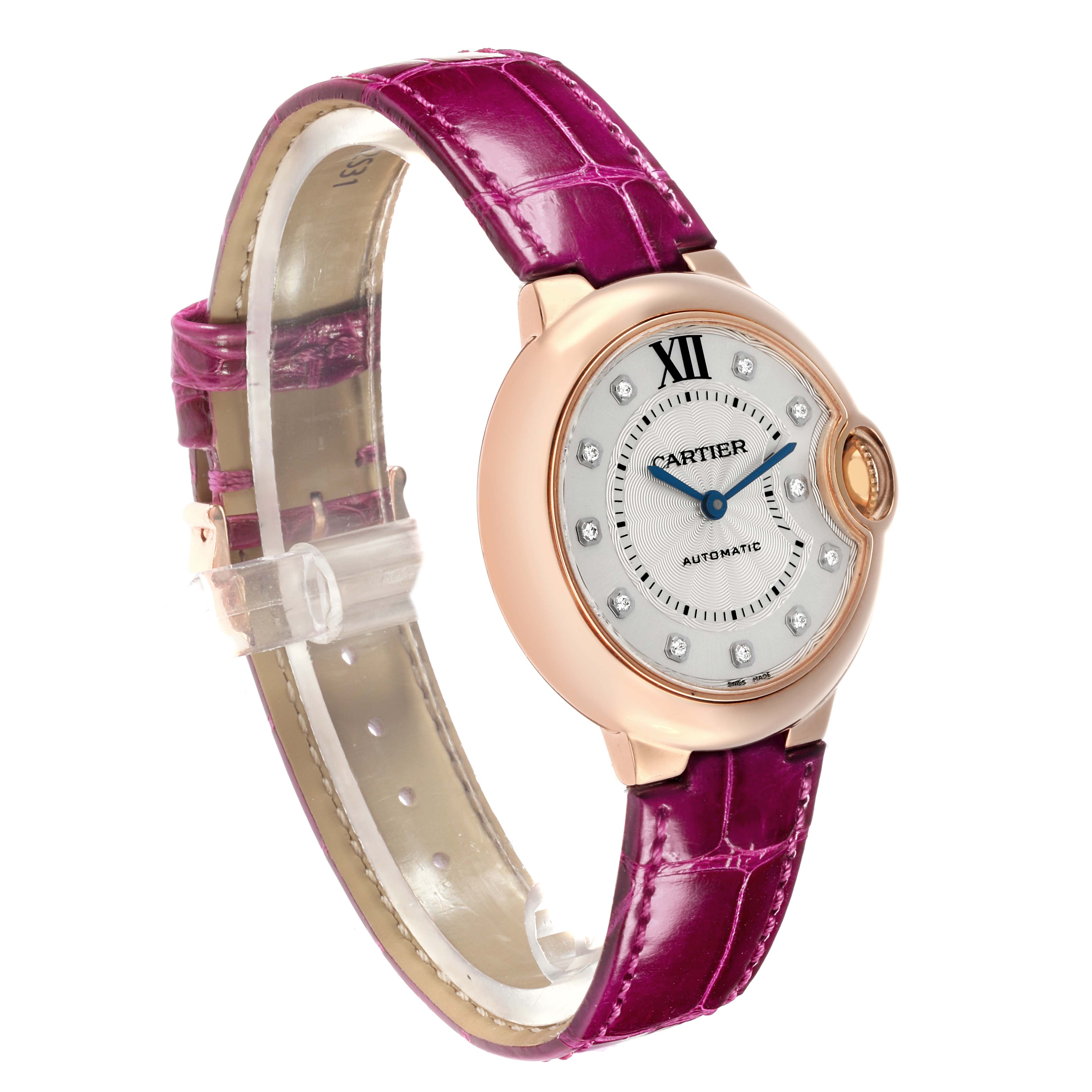 The Cartier Ballon Bleu WE902063 Women
s Rose Gold Silver Dial watch is shown at a three-quarter angle, highlighting the face, strap, and crown.