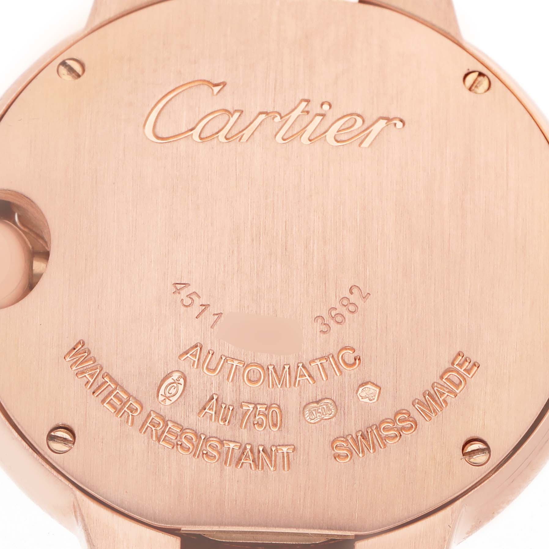 The image shows the back of a Cartier Ballon Bleu WE902063 Women
s Rose Gold Silver Dial watch, highlighting the brand logo and specifications.
