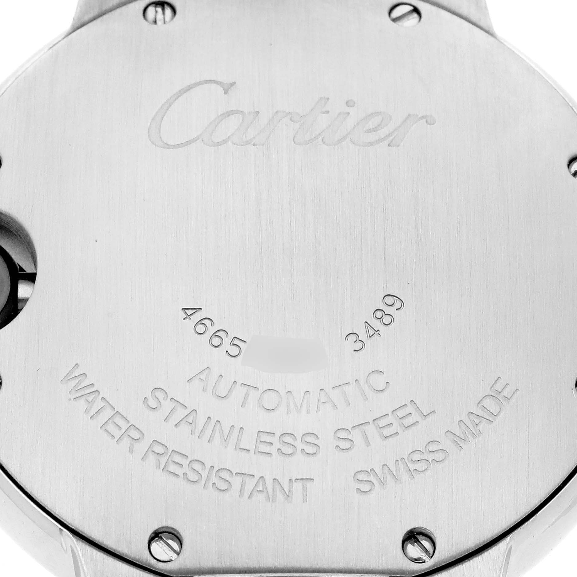 The image shows the back case of a Ballon Bleu de Cartier, highlighting its engravings and screws.