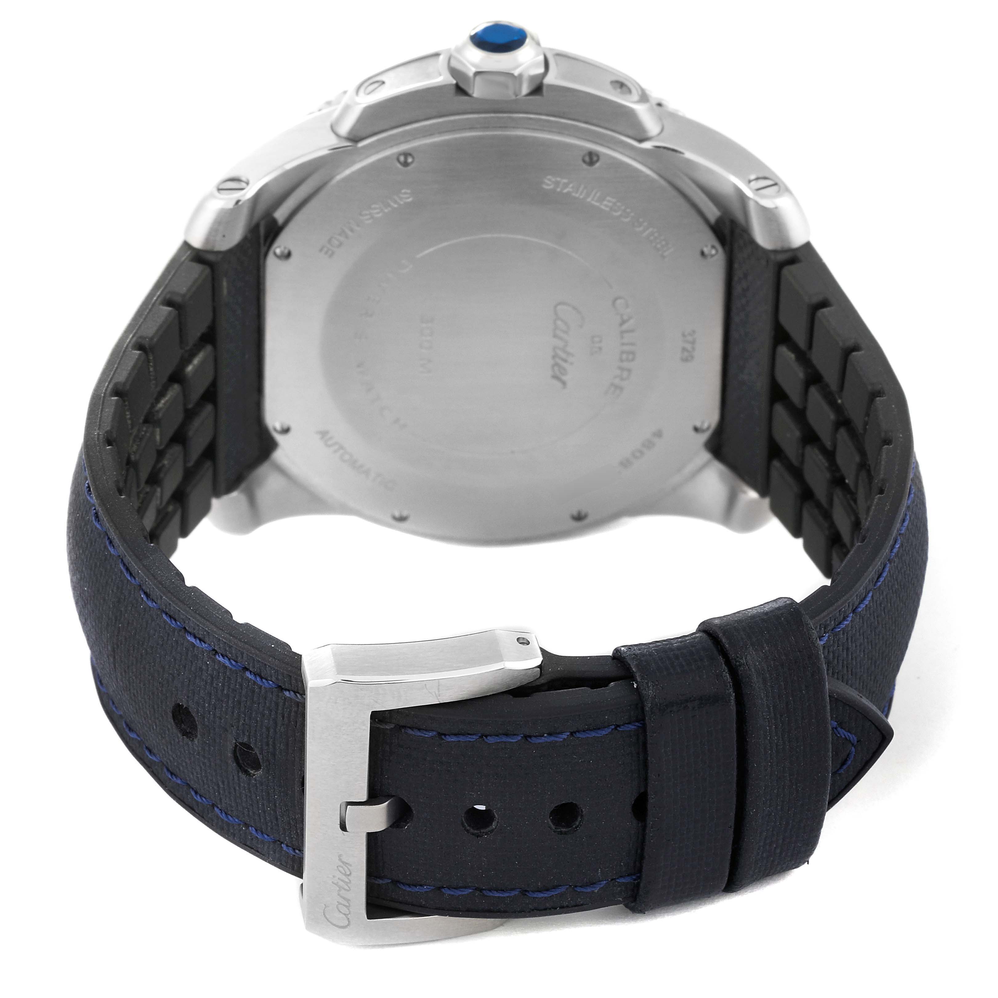 The image shows the back view of a Calibre de Cartier watch by Cartier, highlighting the buckle, strap, and case back.