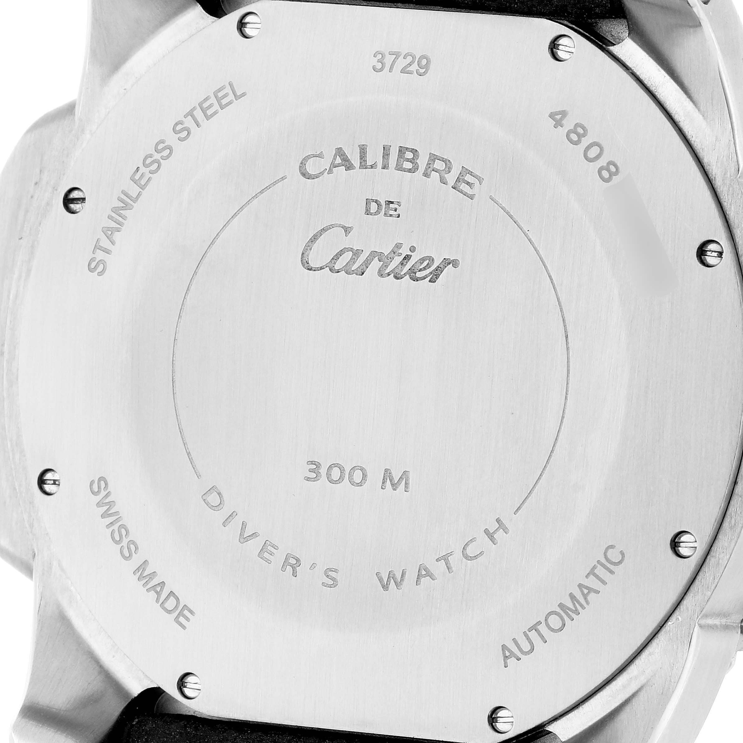 This image shows the back case of the Calibre de Cartier watch by Cartier, featuring details like "300 M" and "Swiss Made."