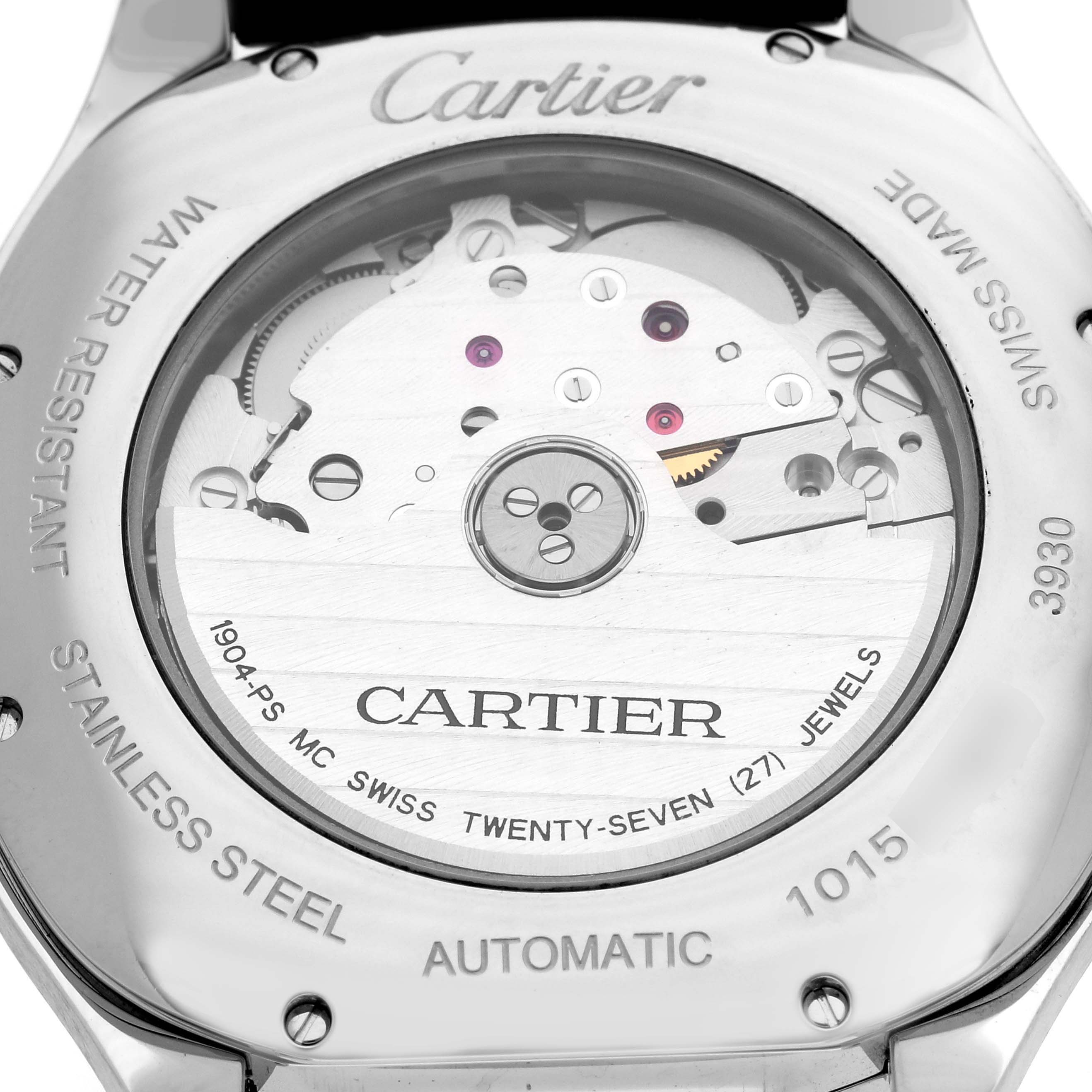 The image shows the back of a Drive de Cartier watch, highlighting its automatic movement and stainless steel casing.
