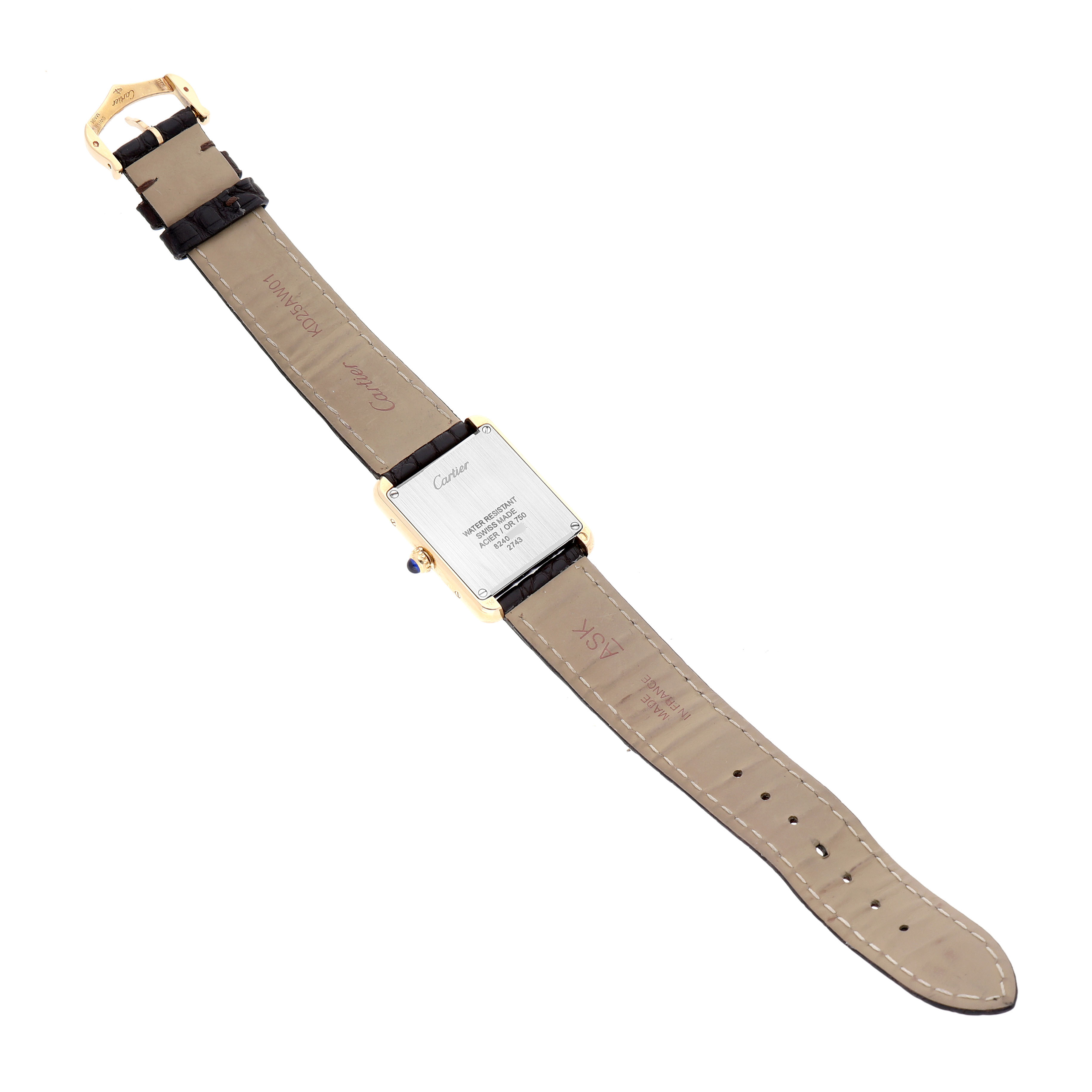 The Cartier Tank Solo W1018755 Women's Yellow Gold Silver Dial watch is shown from the back, displaying its case back, strap, and buckle.