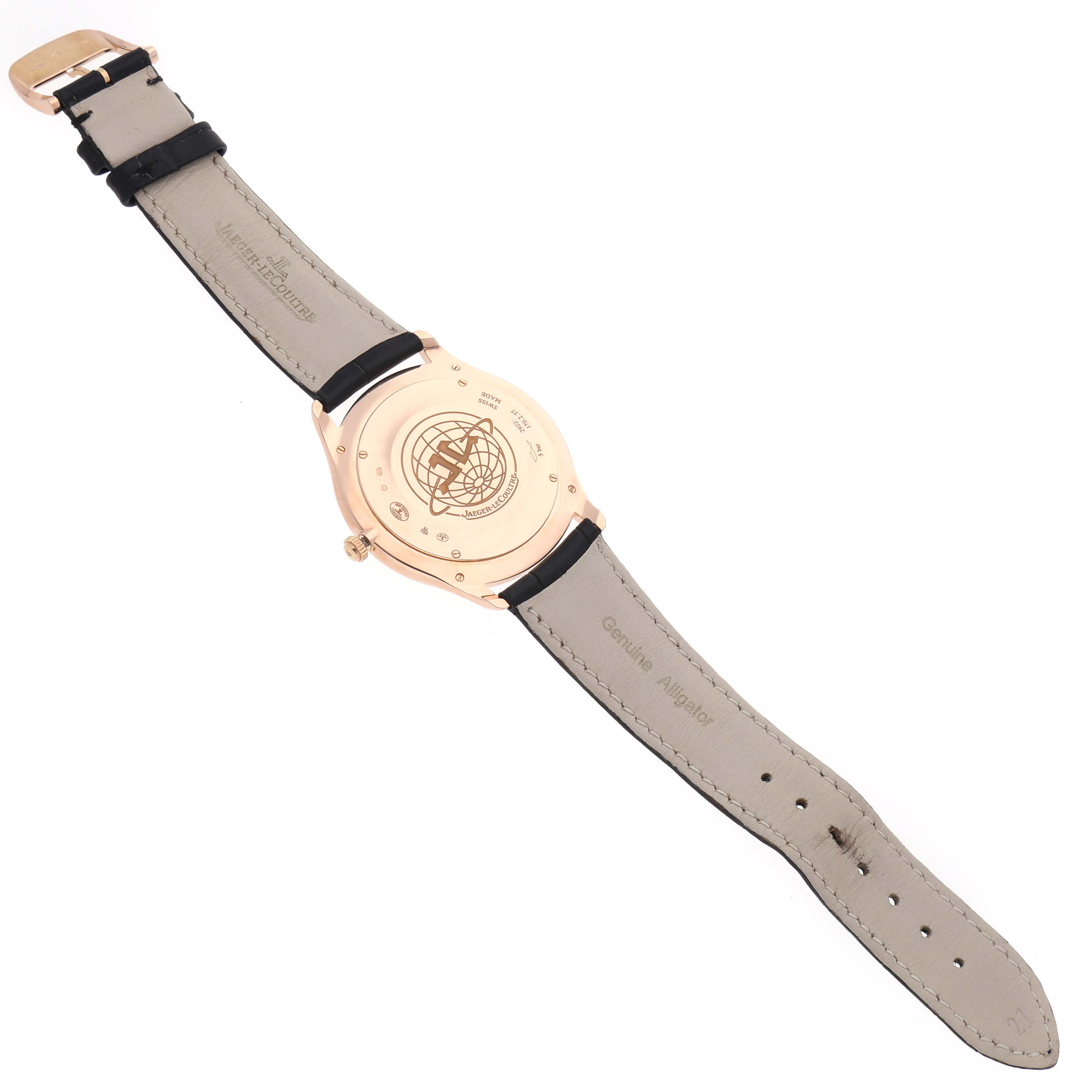 The image shows the back view of a Jaeger LeCoultre Master Q1332511 Men
s Rose Gold Beige Dial model, highlighting the case back and leather strap.